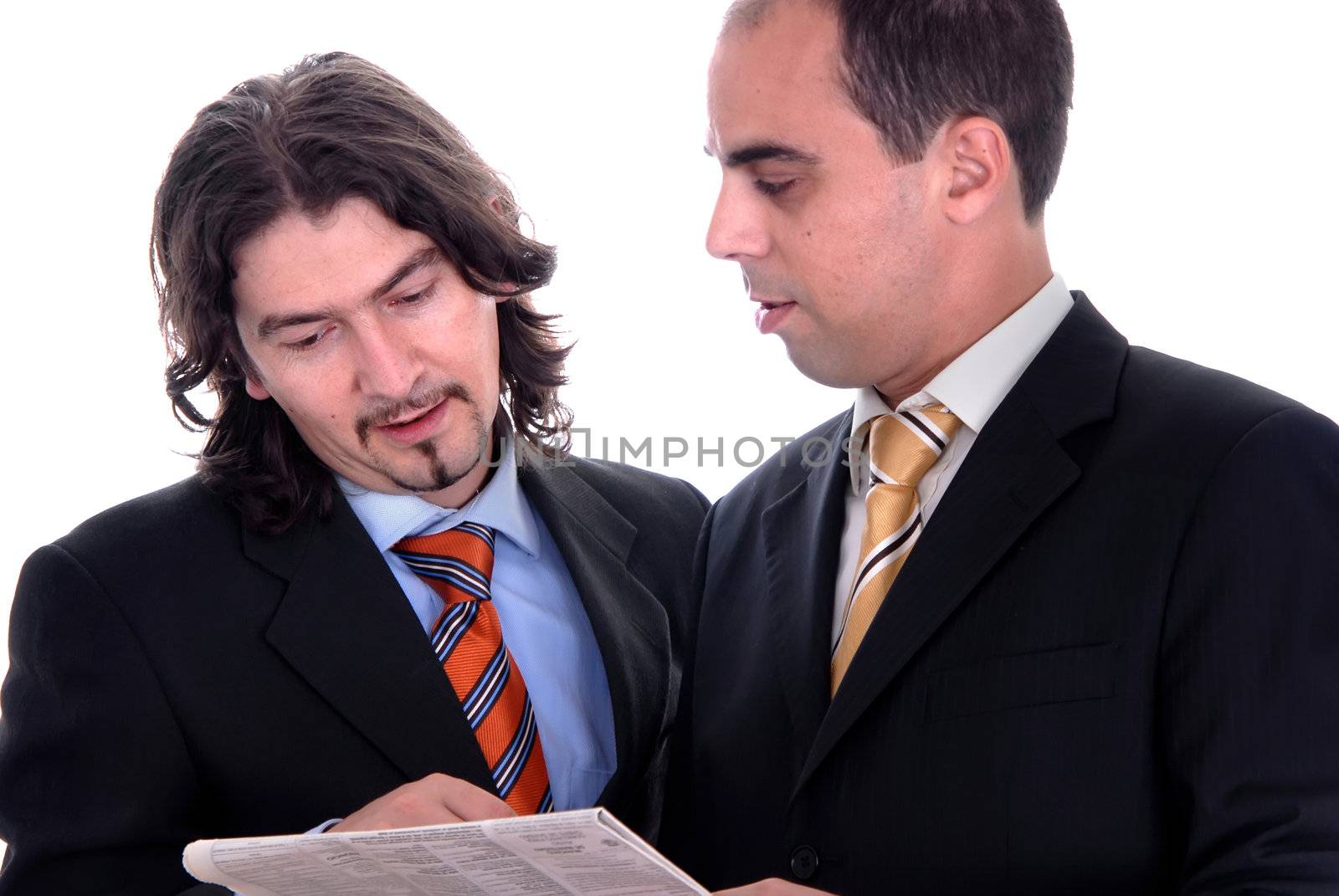 two business men reading the newspaper isolated