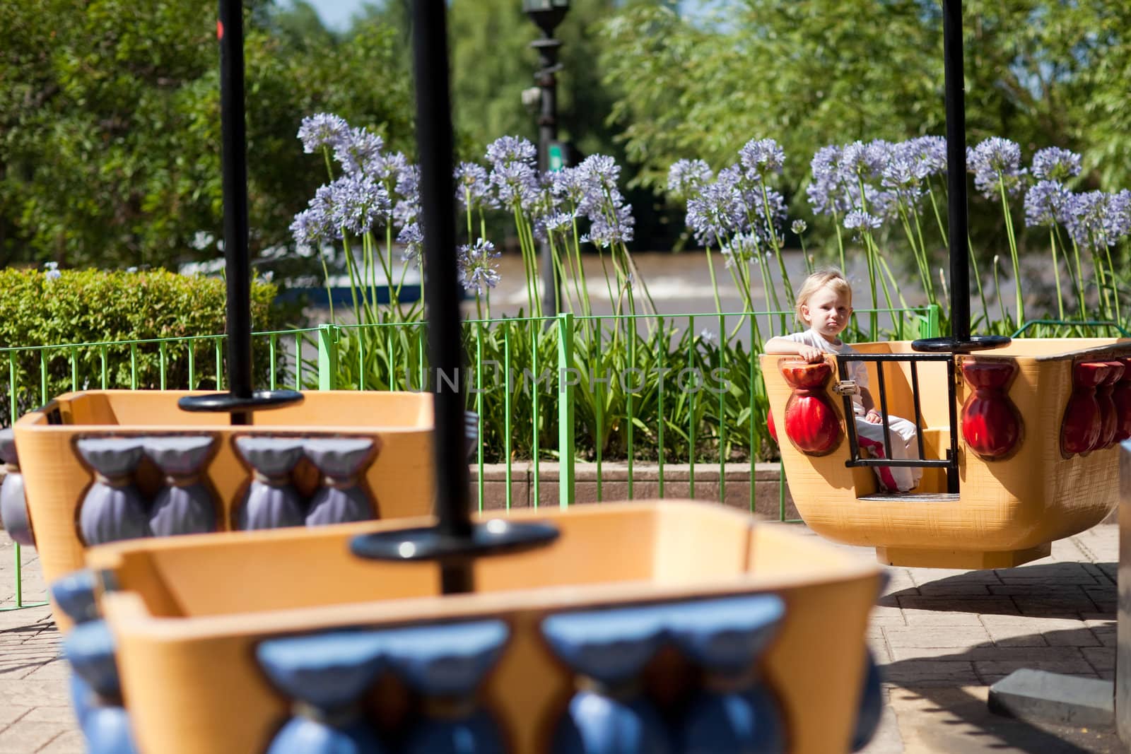 child in park of attractions
