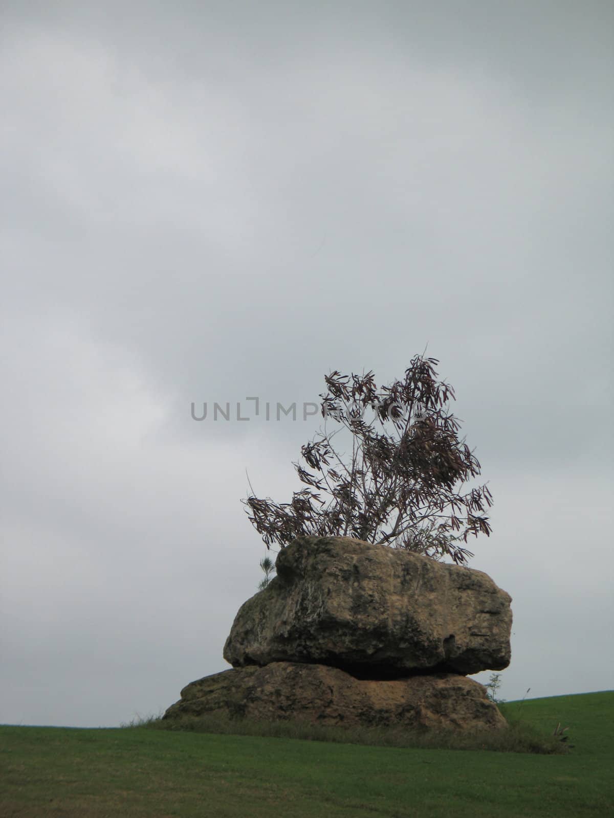 piled stones on a hill by mmm