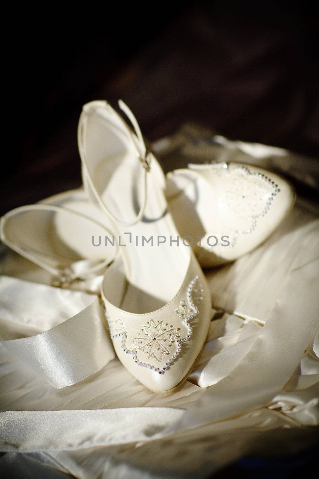 two white shoes of the bride