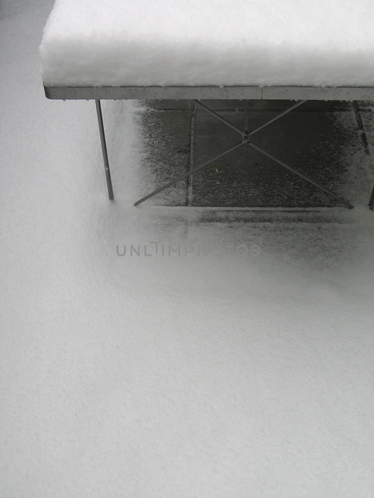 white snow on a table by mmm