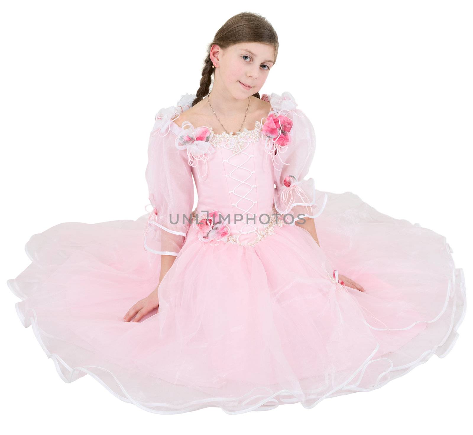 Girl in pinkish dress on a white background