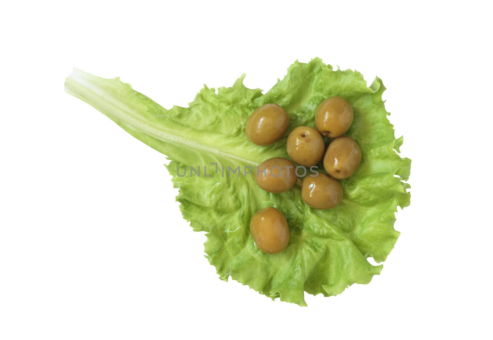 Few green olives lying on lettuce leaf. Isolated on white with clipping path