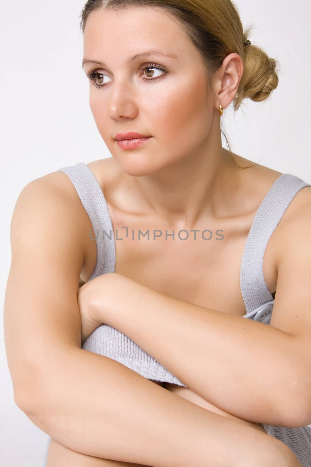 Portrait of young beautiful woman on white background