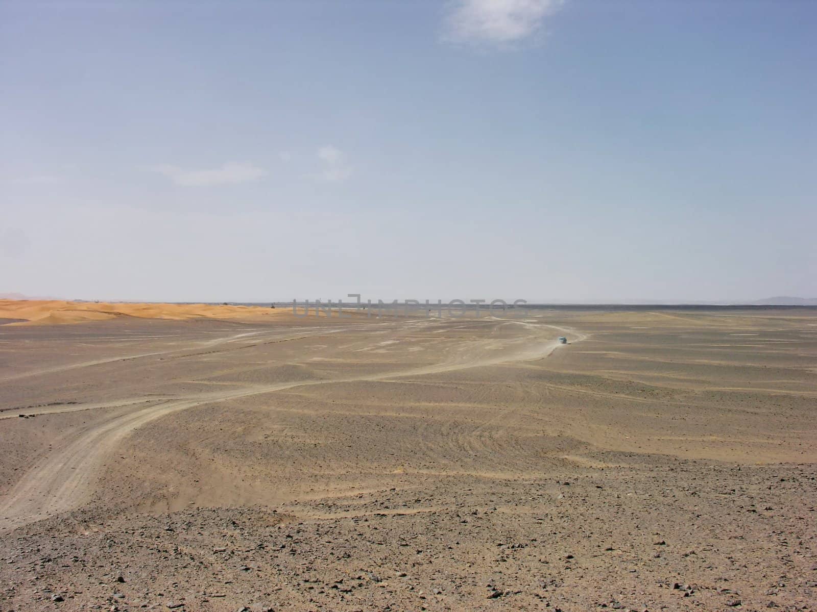 Road going into rocky desert in Morocco