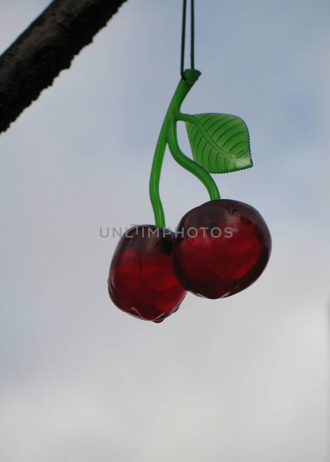 red plastic cherries