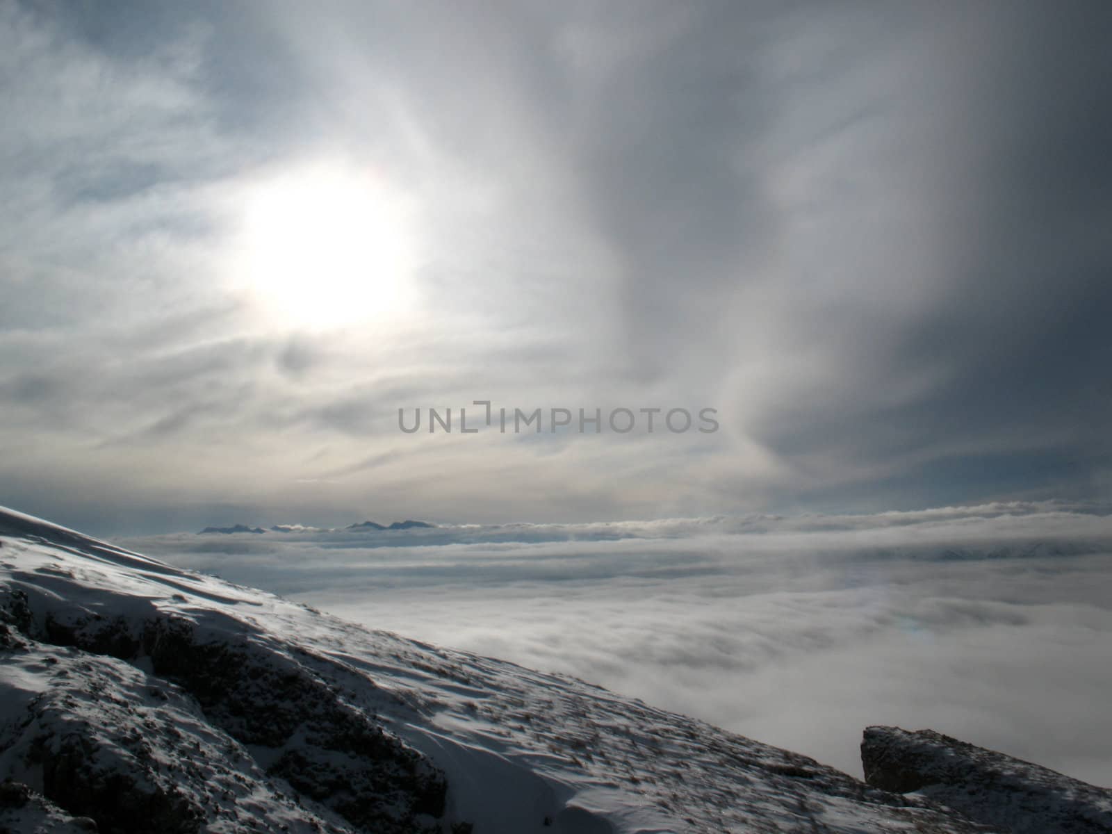 glacier; snow; top; mist; the cloud; blue sky by Viktoha