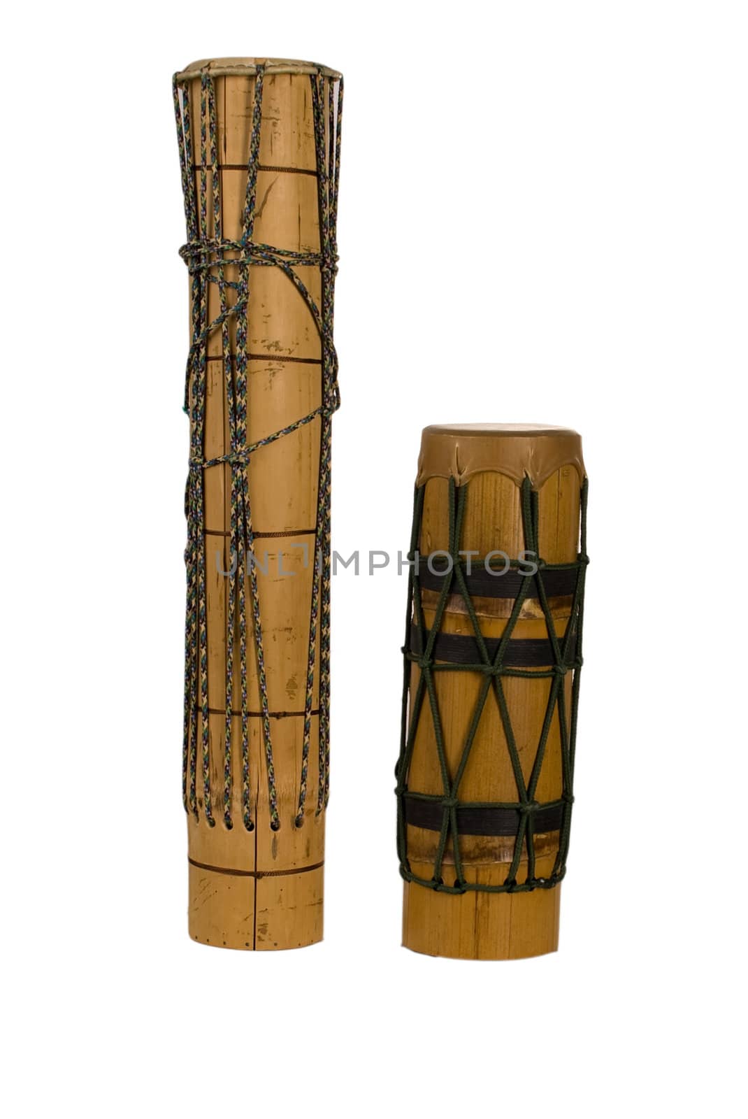 group of wooden exotic african drums isolated on white background