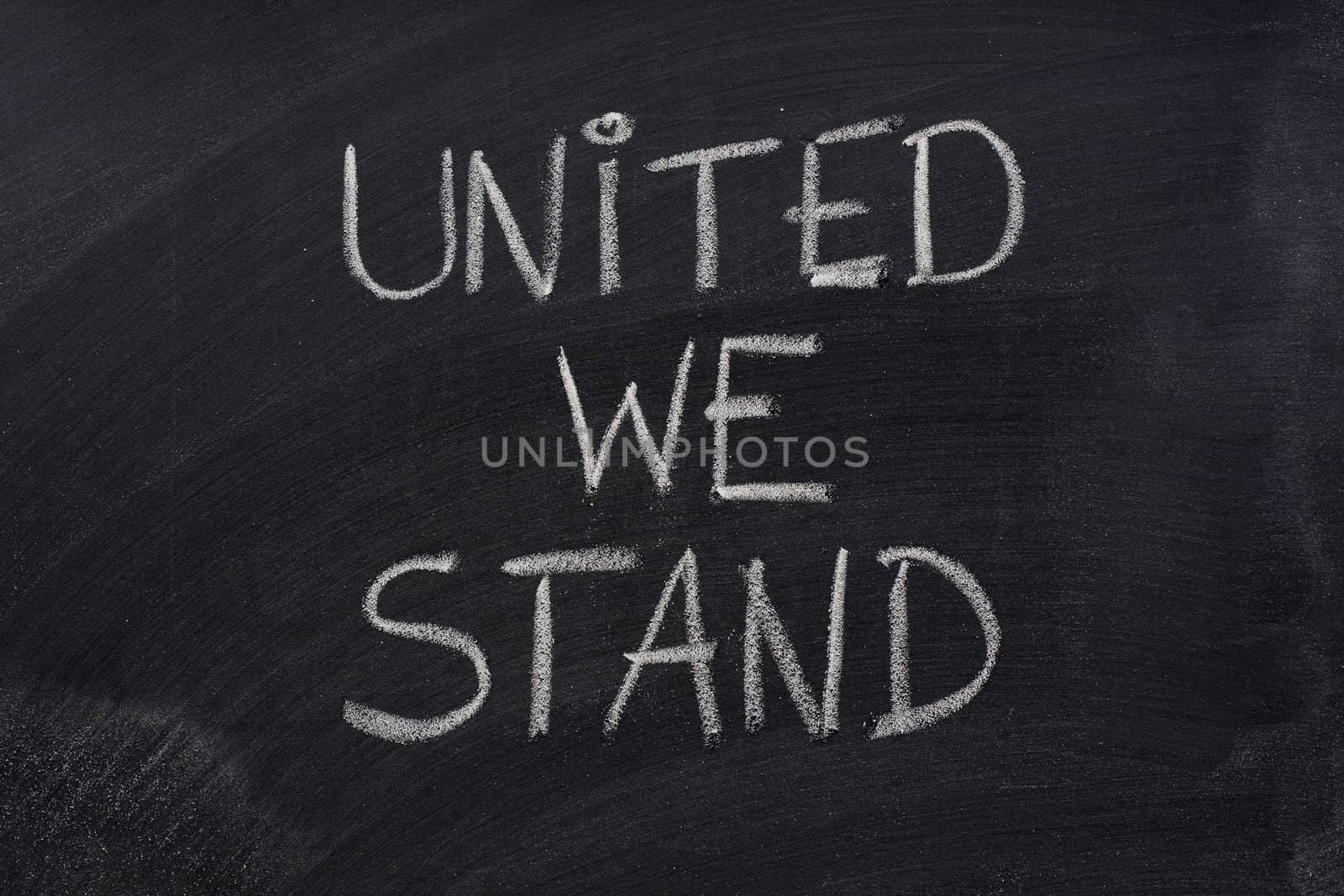united we stand phrase on blackboard by PixelsAway