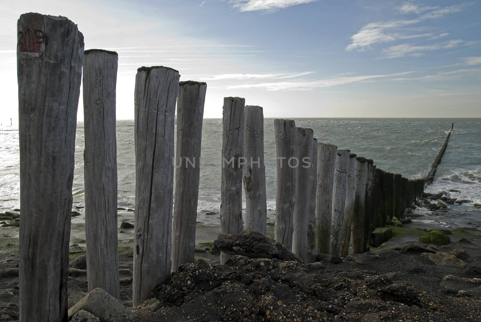 North Sea beach with breakwater,Netherlands by Gertje