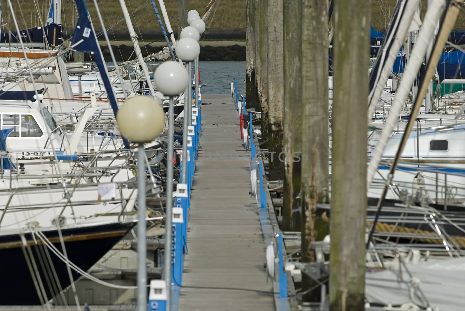 Harbor with yachts and sailboats in the Netherlands