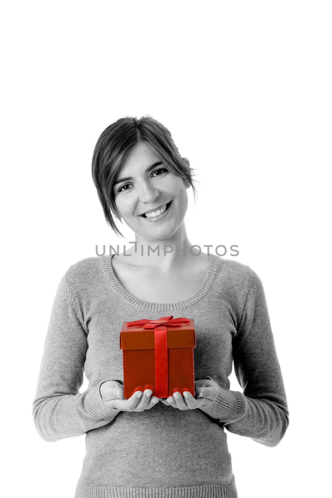 Portrait of a young woman holding a gift isolated on white background - toned in PS