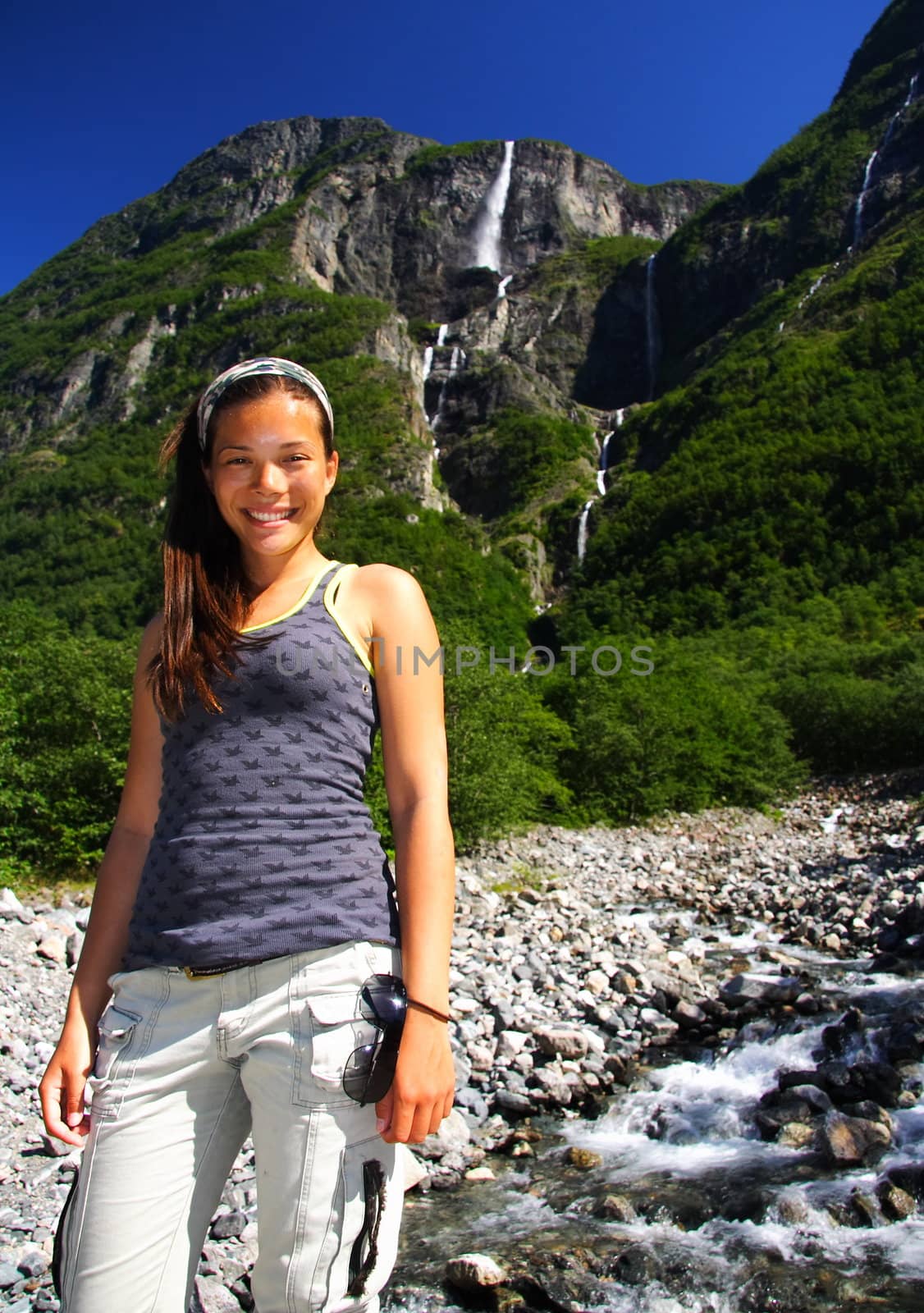 Woman hiking in norway by Maridav