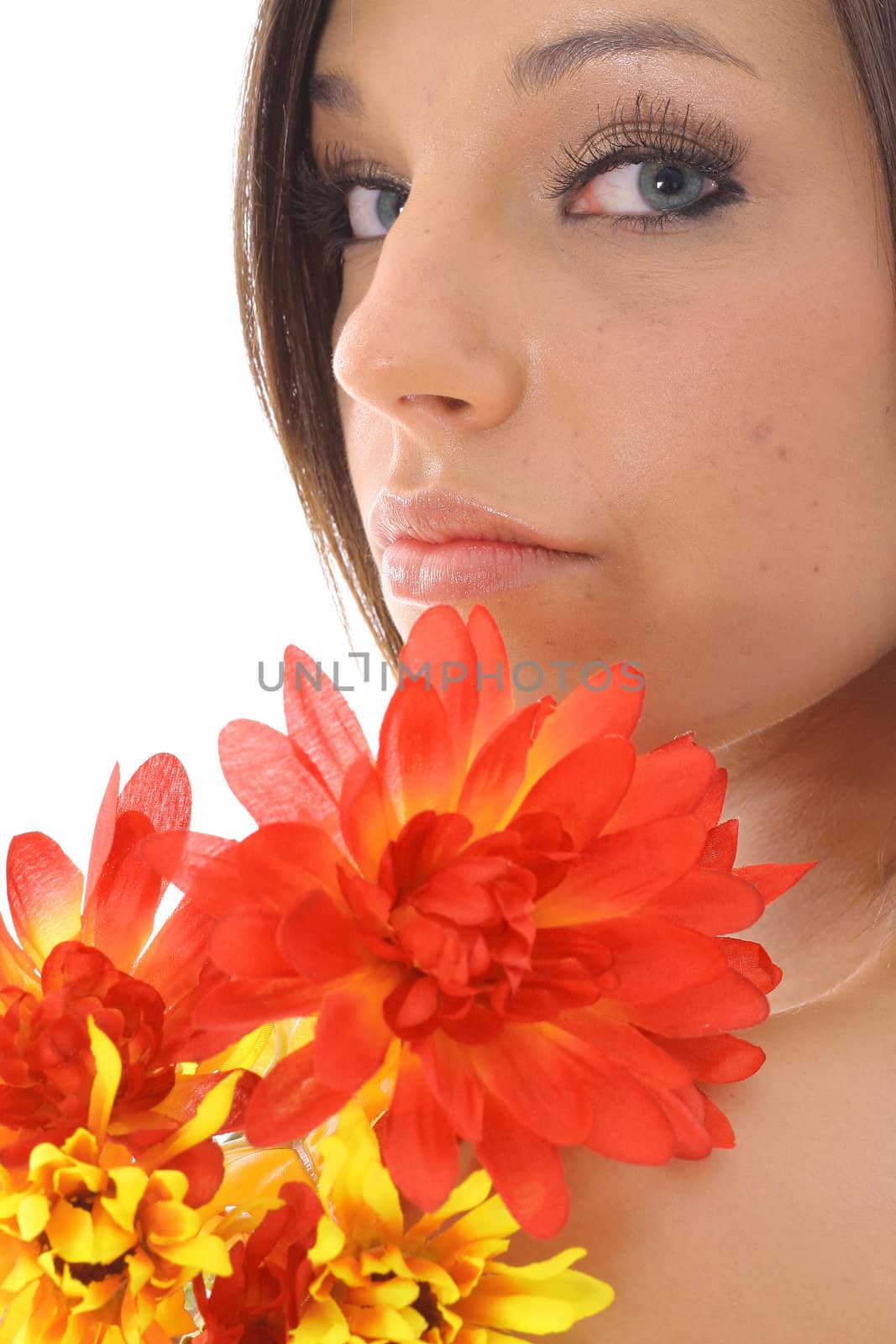 shot of a beautiful model with flowers by creativestock