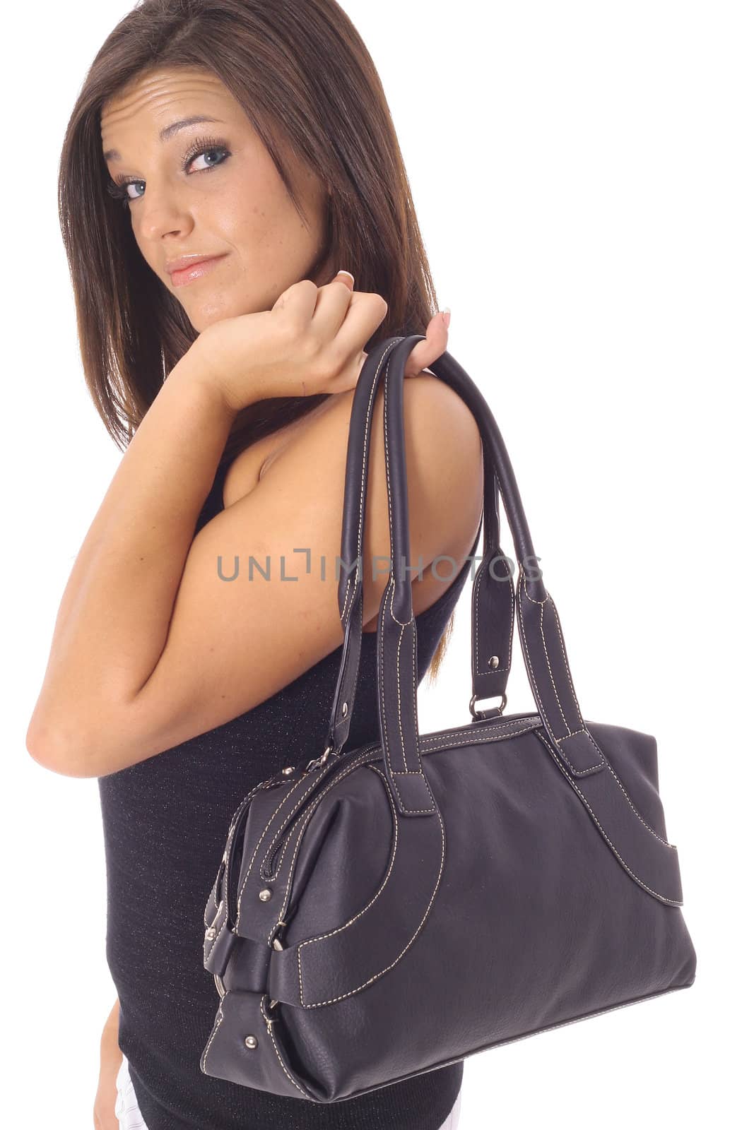 shot of a latino model carrying fashion bag by creativestock