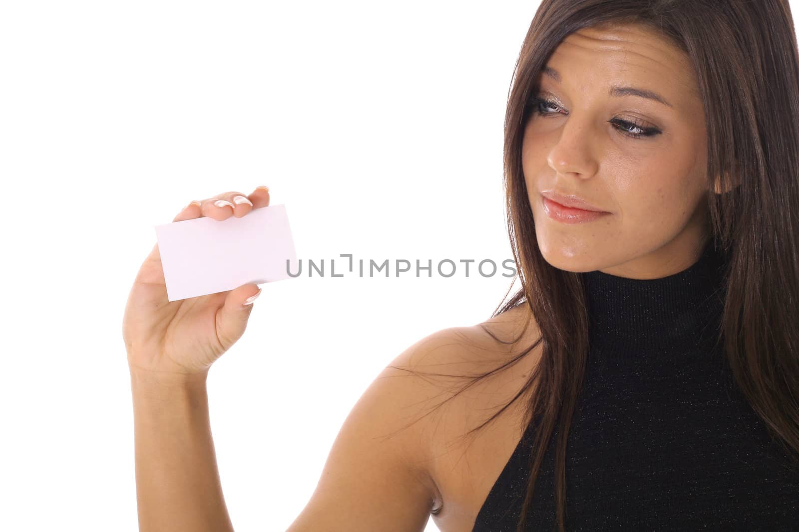 beautiful woman looking at a business card