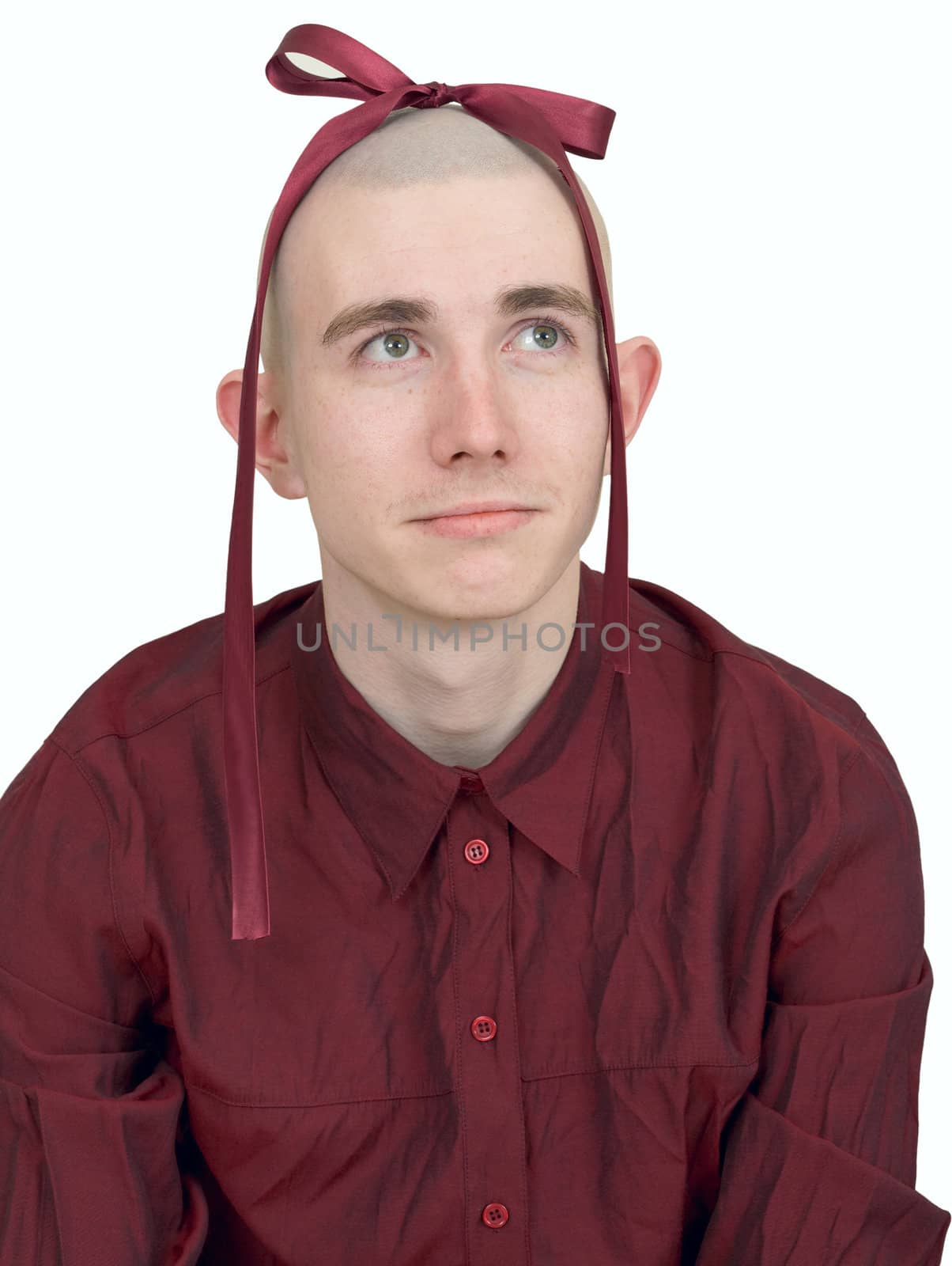 Young man with small bow on bald head