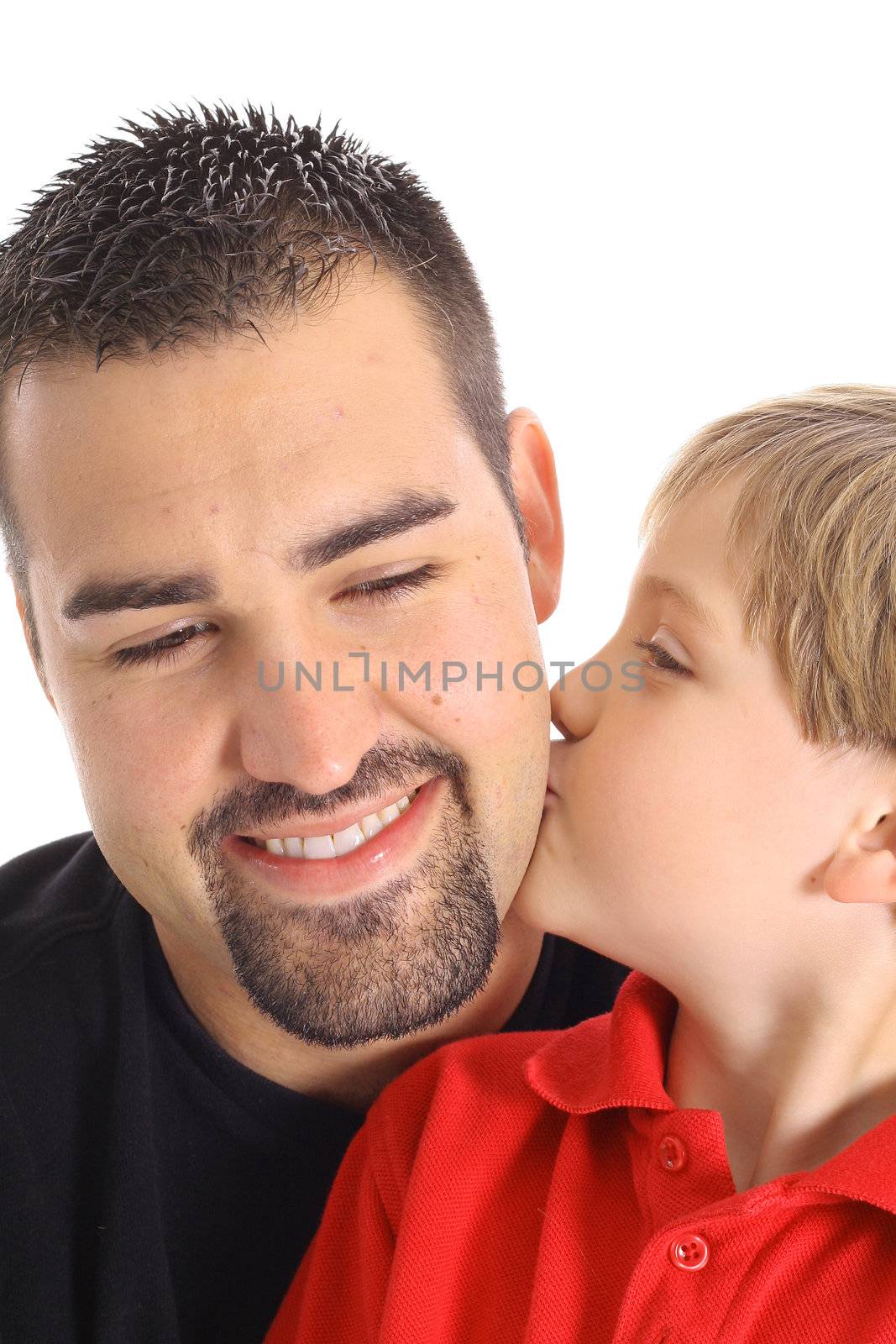 child kissing dad on the cheek isolated on white by creativestock