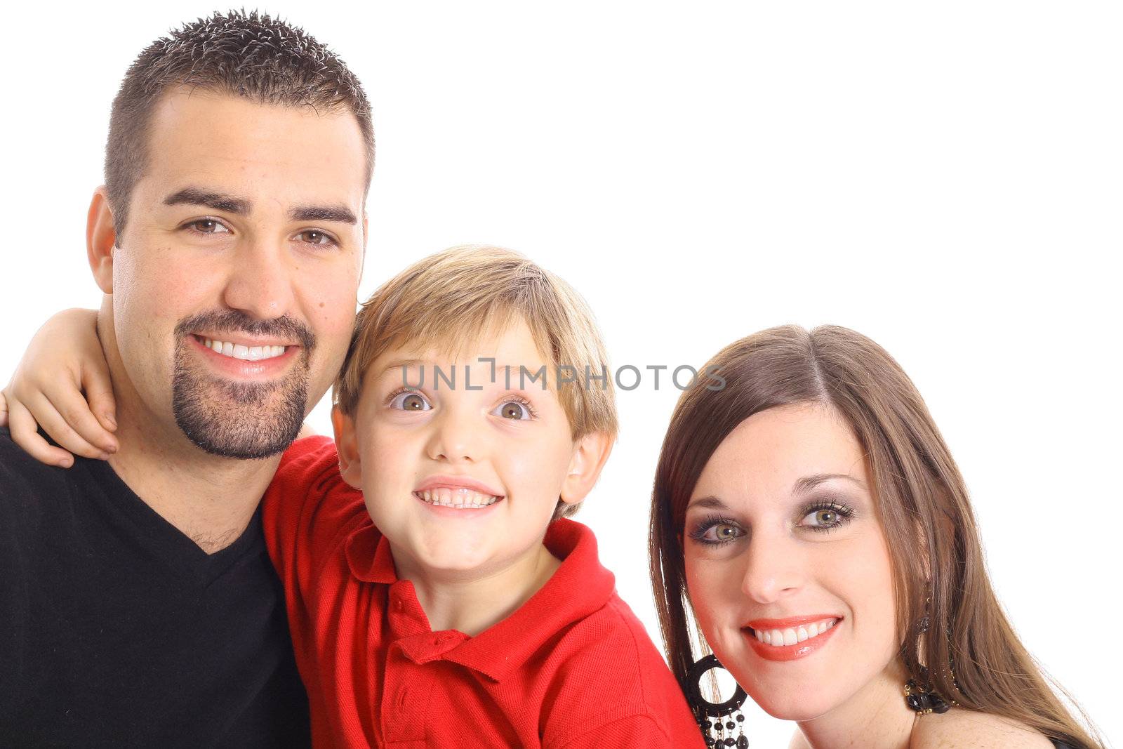 little boy making funny face for family portrait isolated on white by creativestock