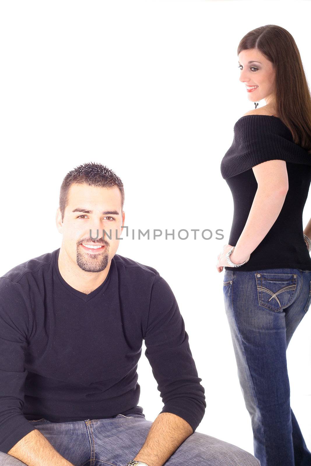 shot of a brunette female checking out male model by creativestock