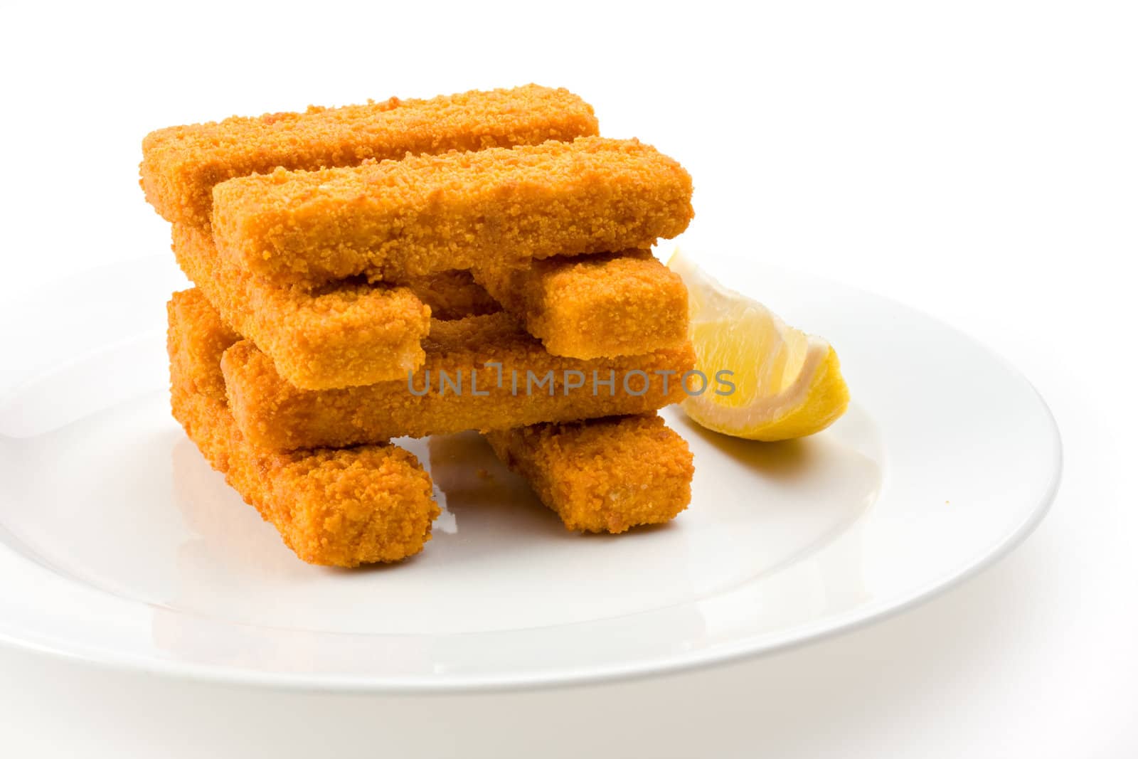 eight fish fingers on a white plate by bernjuer