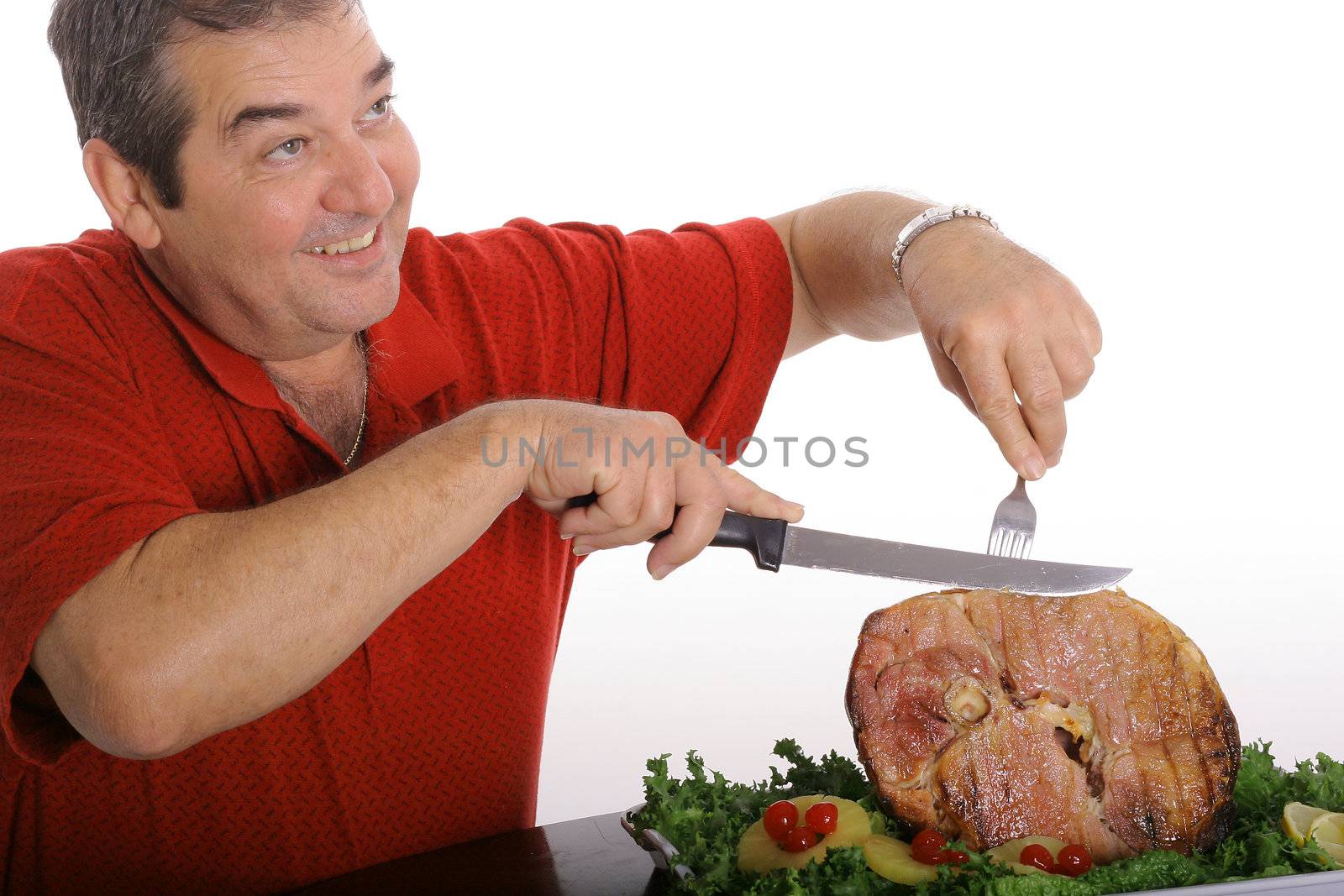 man slicing a ham isolated on white by creativestock
