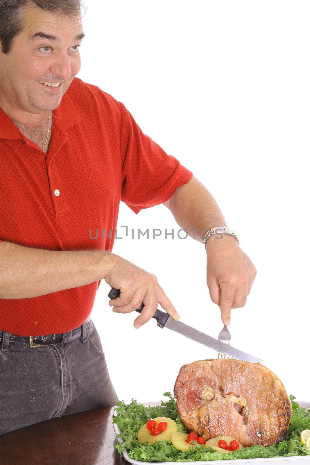 Man slicing a delicious ham