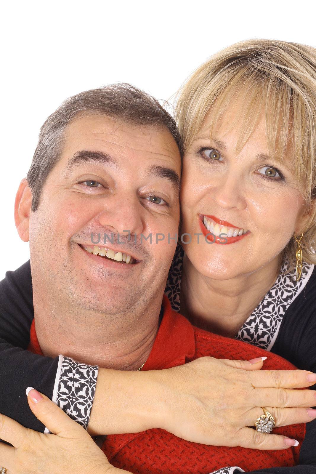 happy couple headshot isolated on white by creativestock