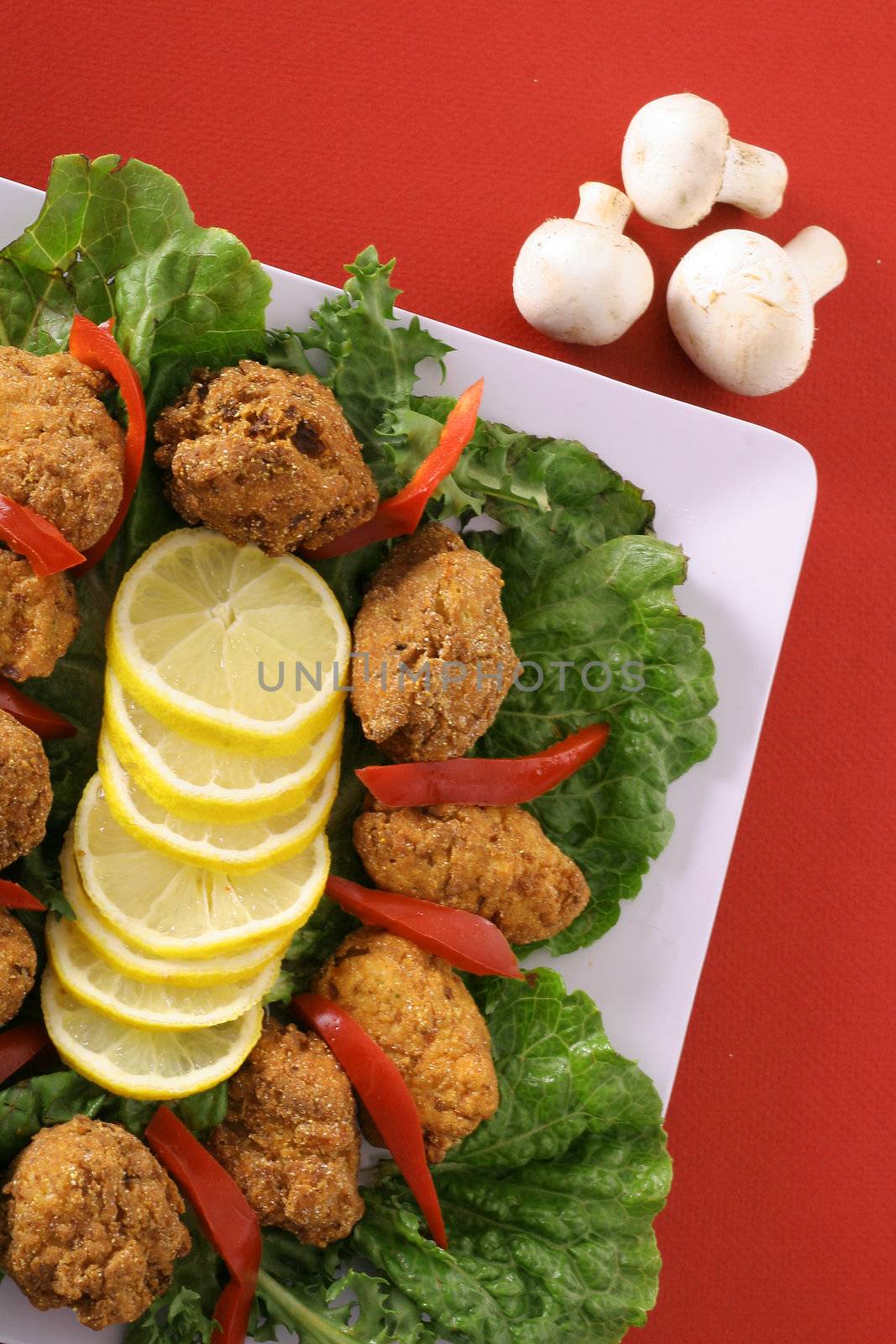 shot of a southern fried appetizer platter vertical by creativestock