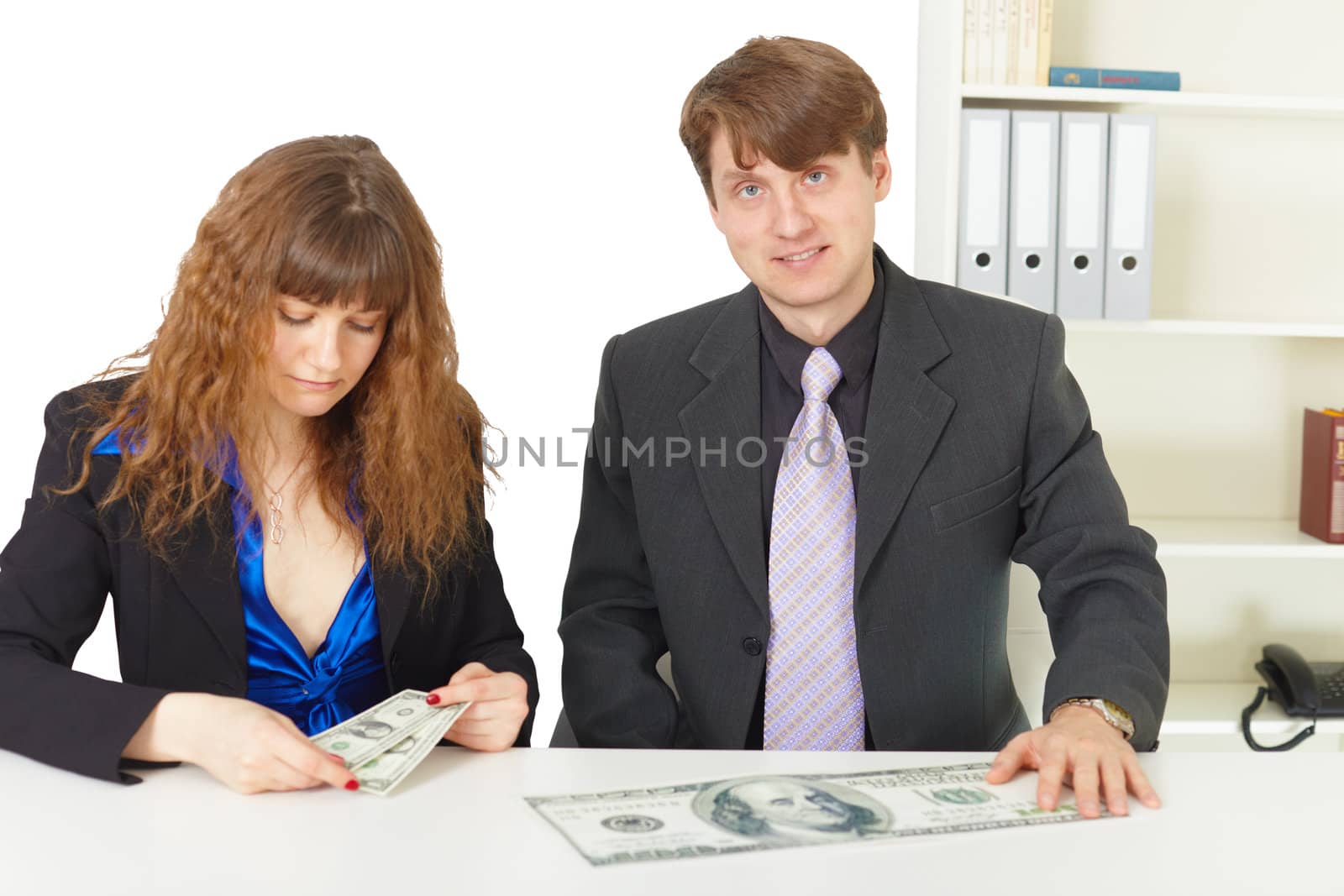 Man and woman have different wages in office