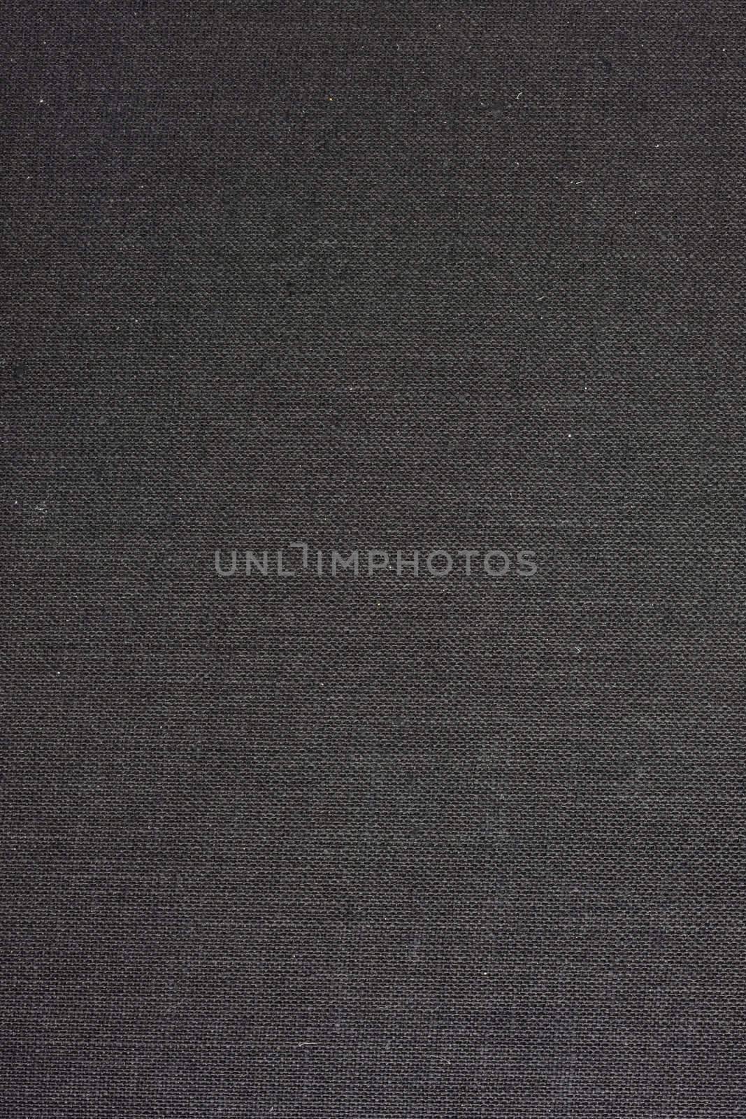 black textile background from 1960s book cover