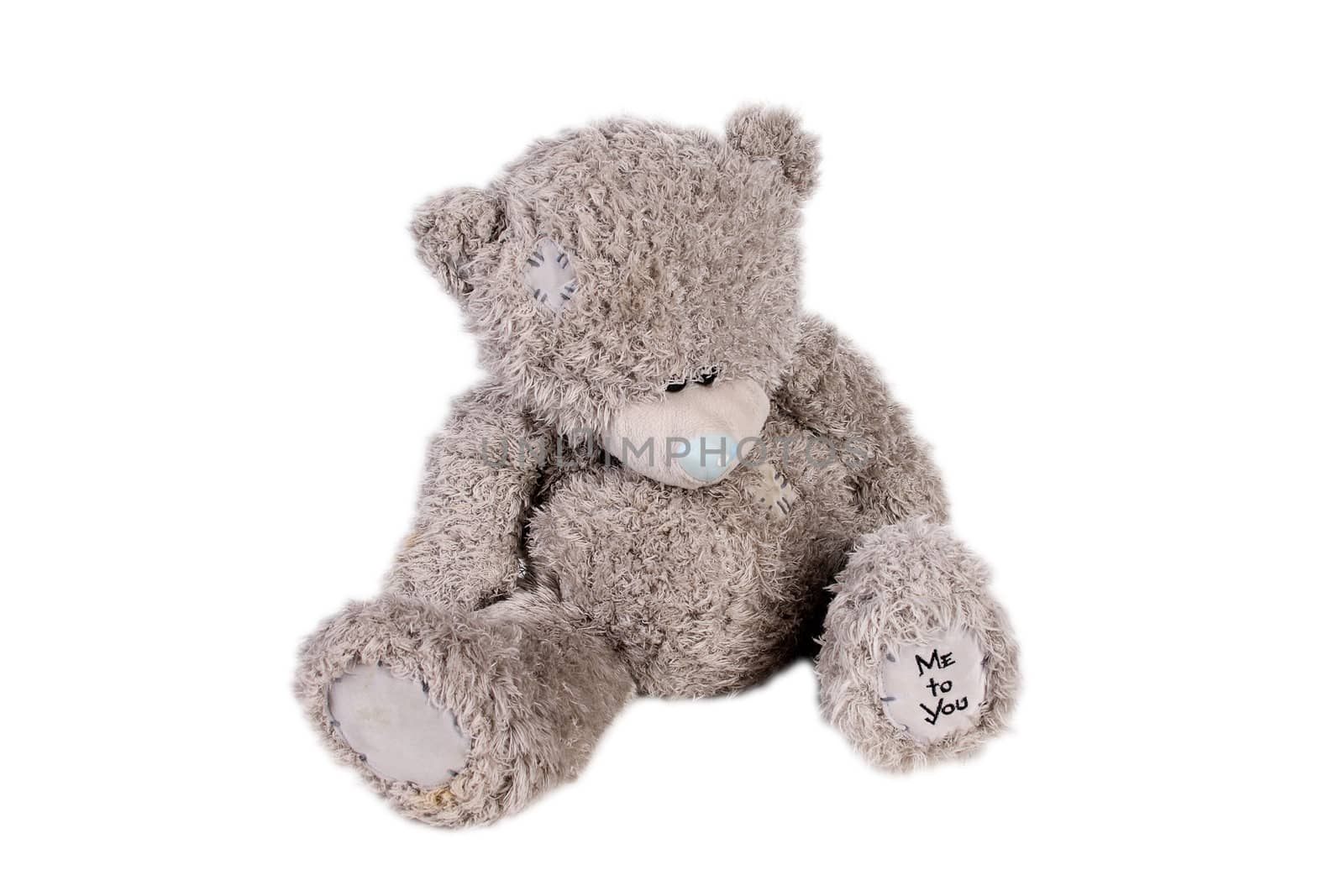 old teddy bear toy isolated over white