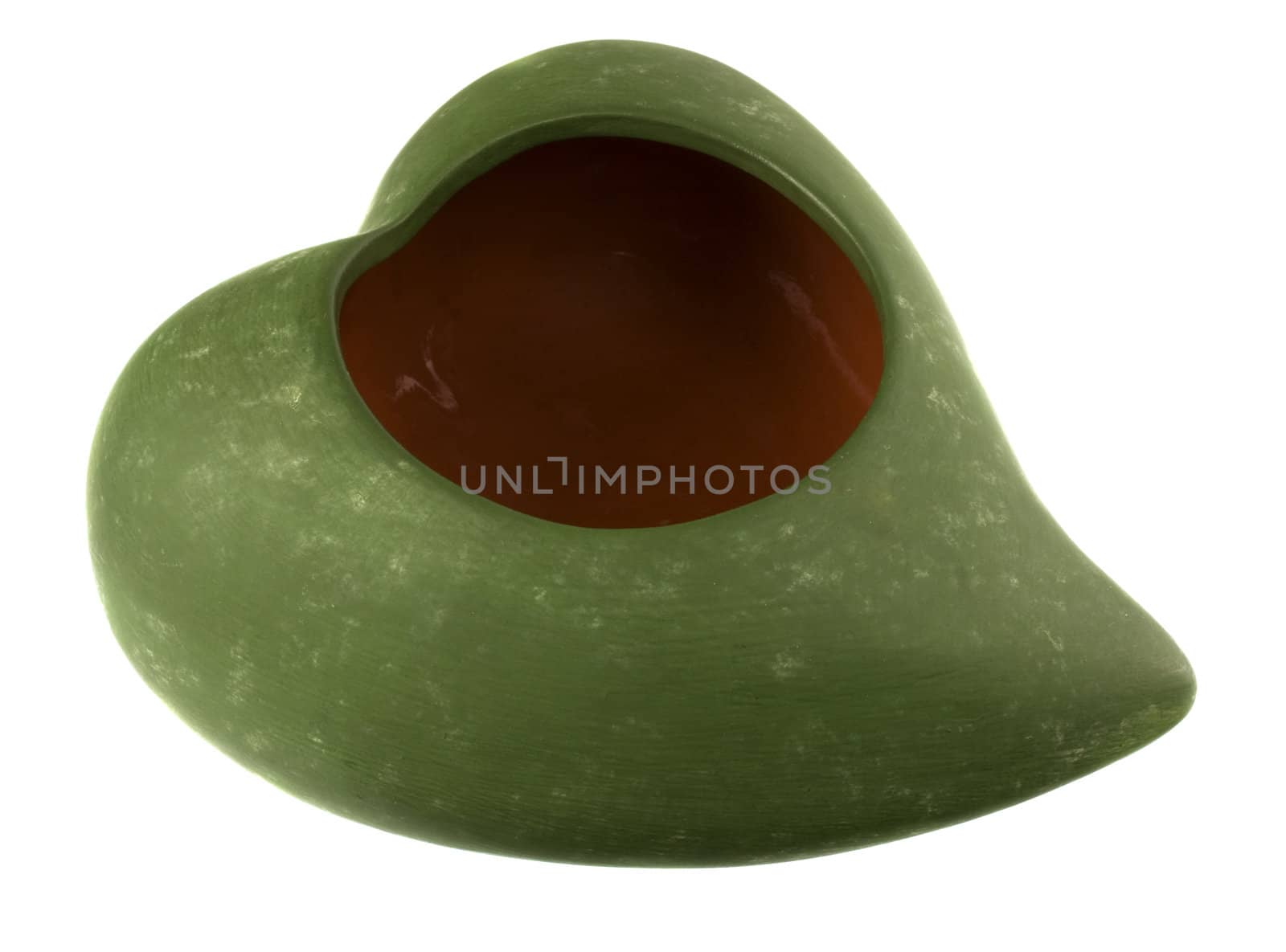 a small clay flower bowl (mass production item) in shape of leaf, green outside, brown inside, isolated on white