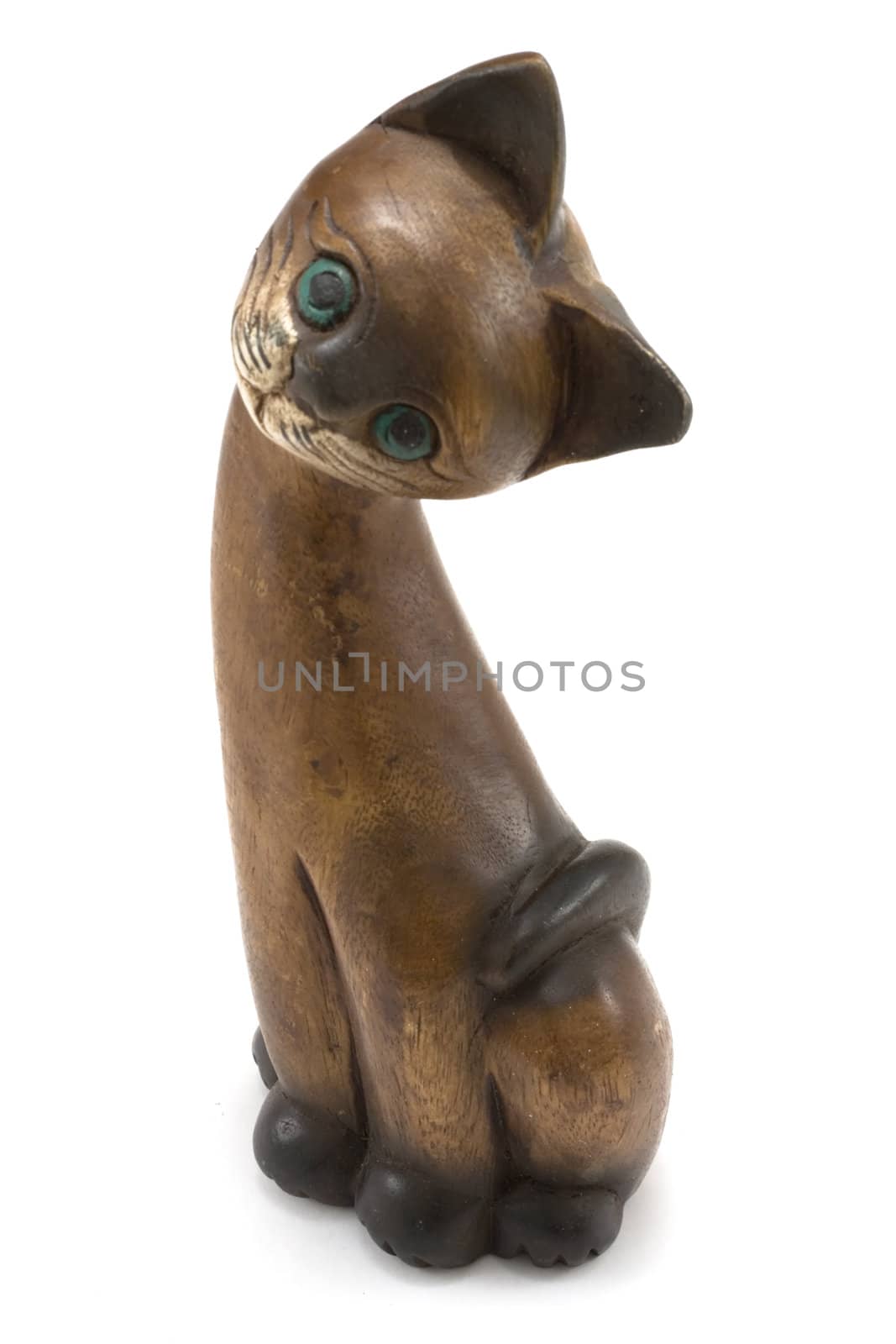 Wooden cat with green eye insulated on white background