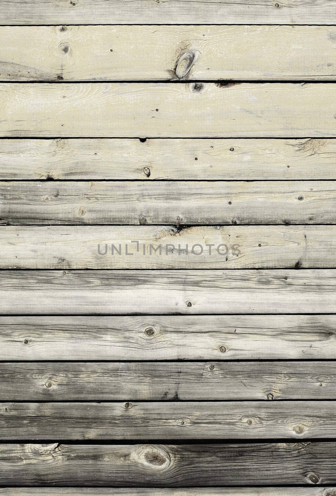 Vertical natural background - an old wooden wall