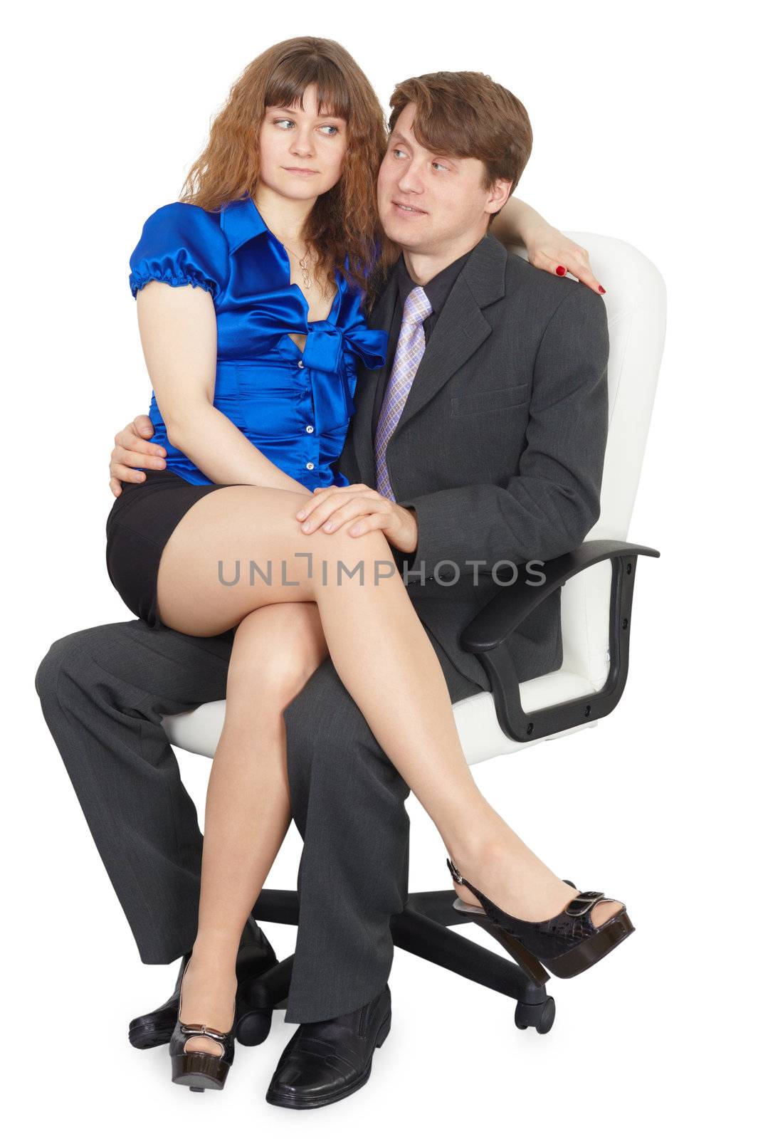 Young couple located in the white chair