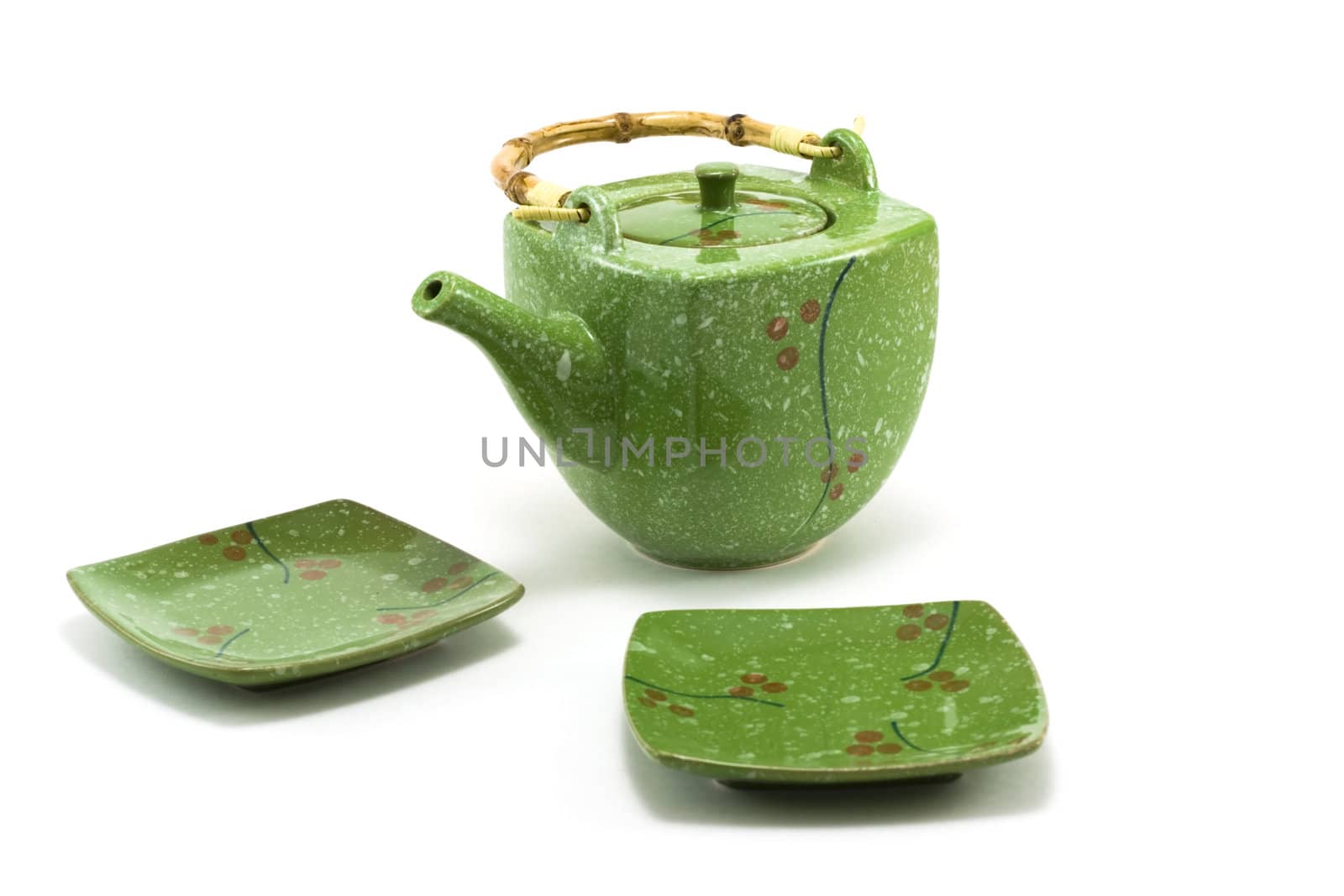 Chinese teapot with bamboo handle and cup insulated on white background