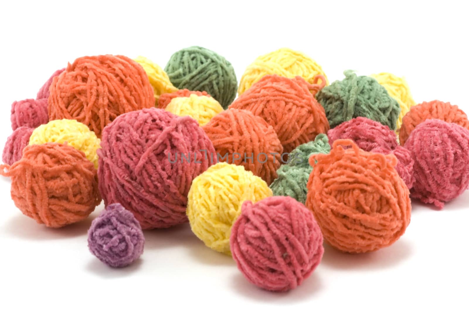 Ball of the colour threads insulated on white background