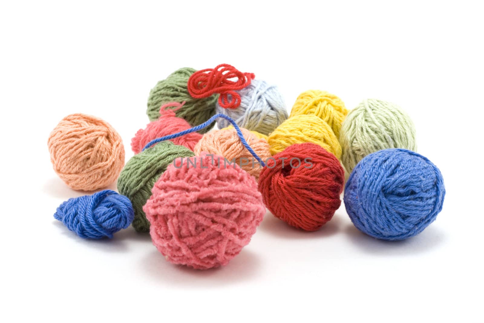 Ball of the colour threads insulated on white background