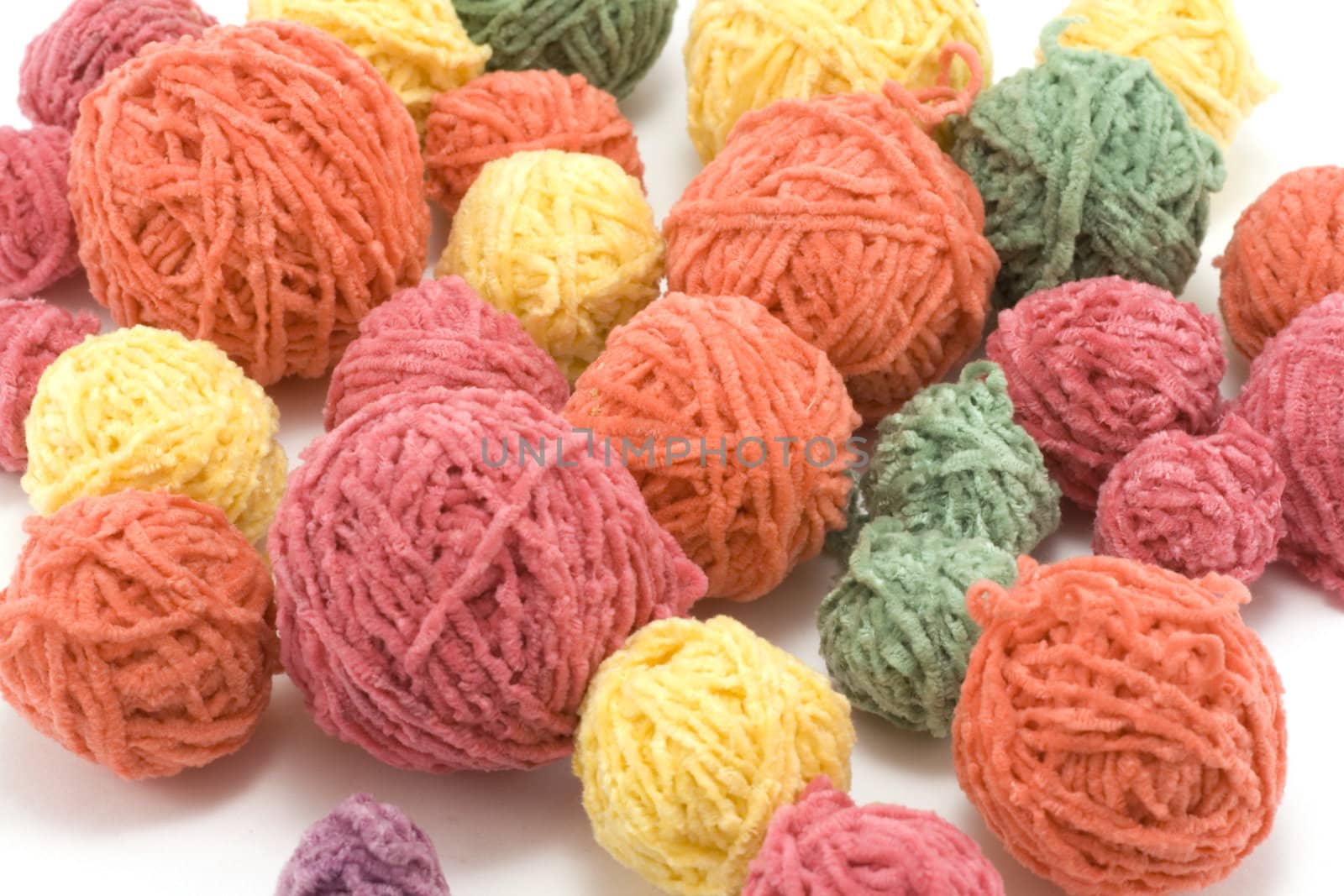 Ball of the colour threads insulated on white background