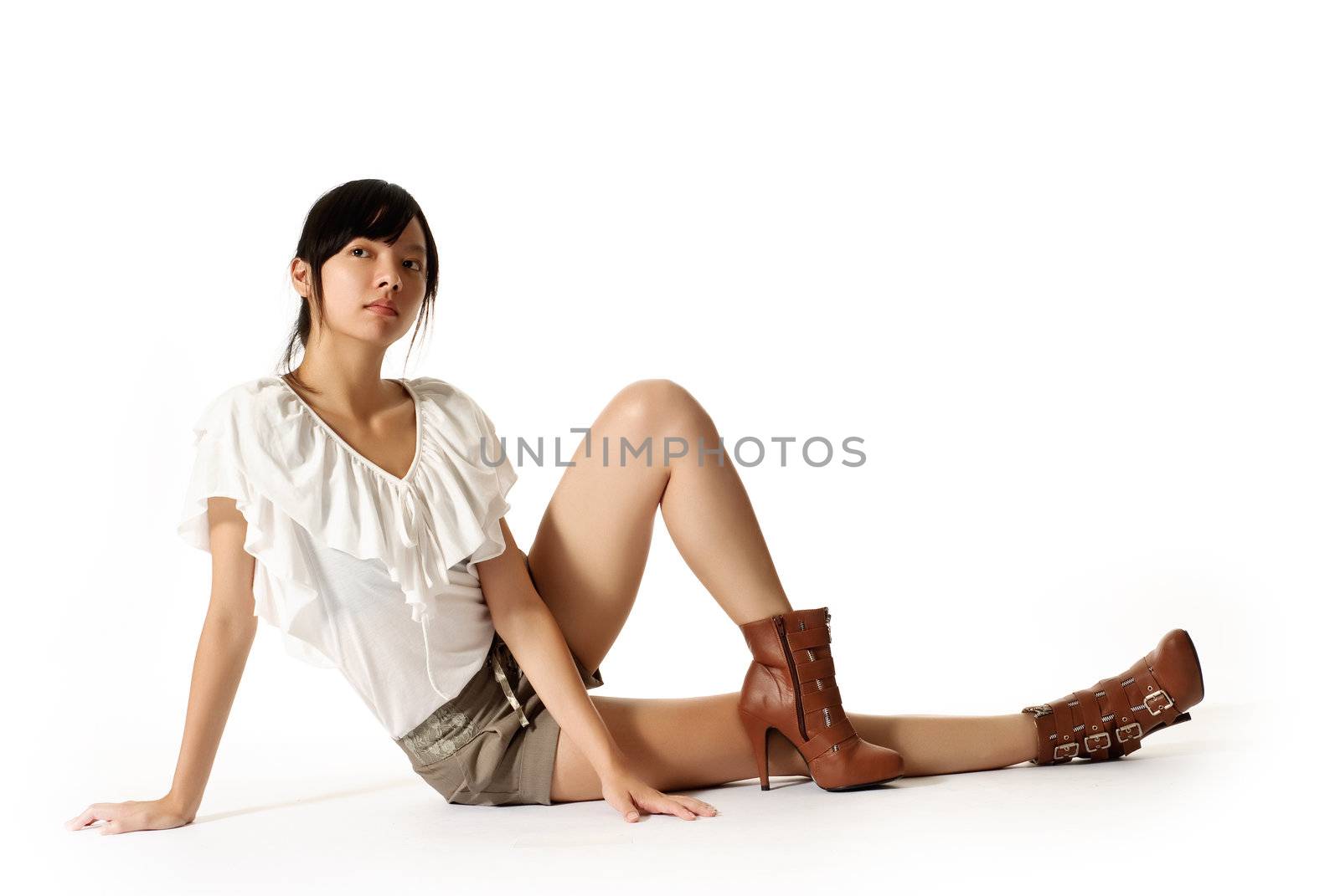 Sexy modern beauty of Asian sit on ground, full length portrait isolated on white background.