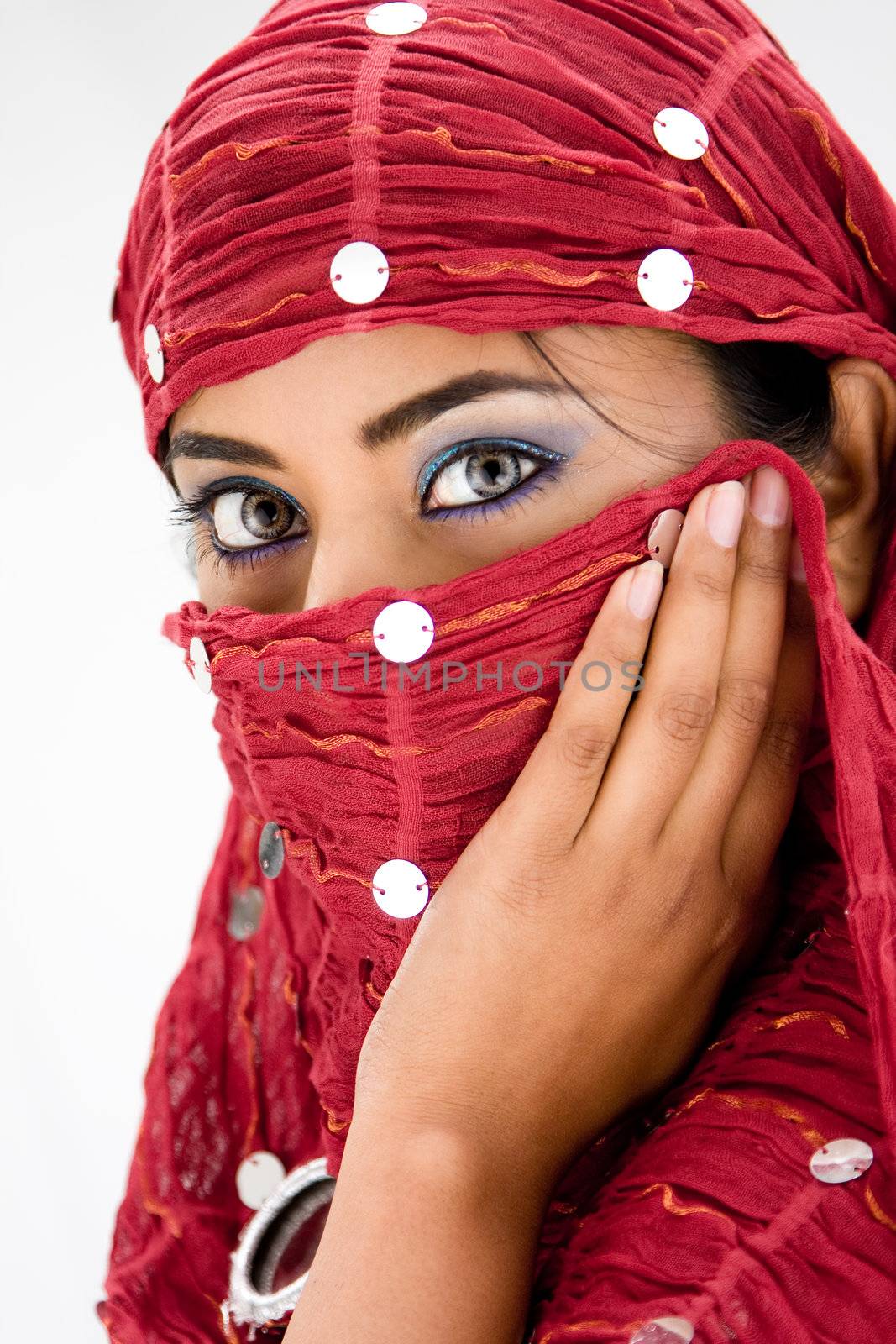 Beautiful woman with red head scarf, isolated