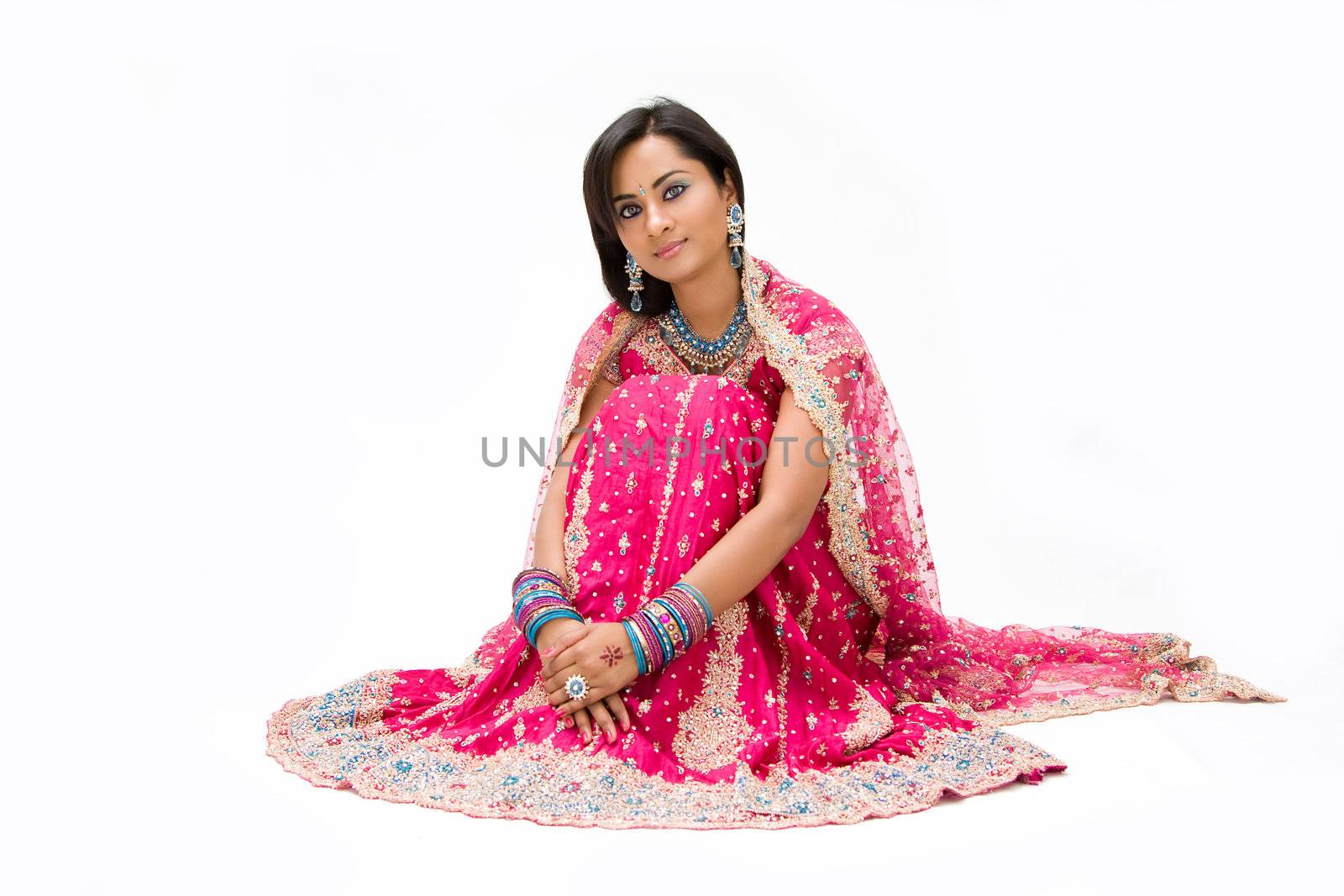 Beautiful Bangali bride sitting by phakimata