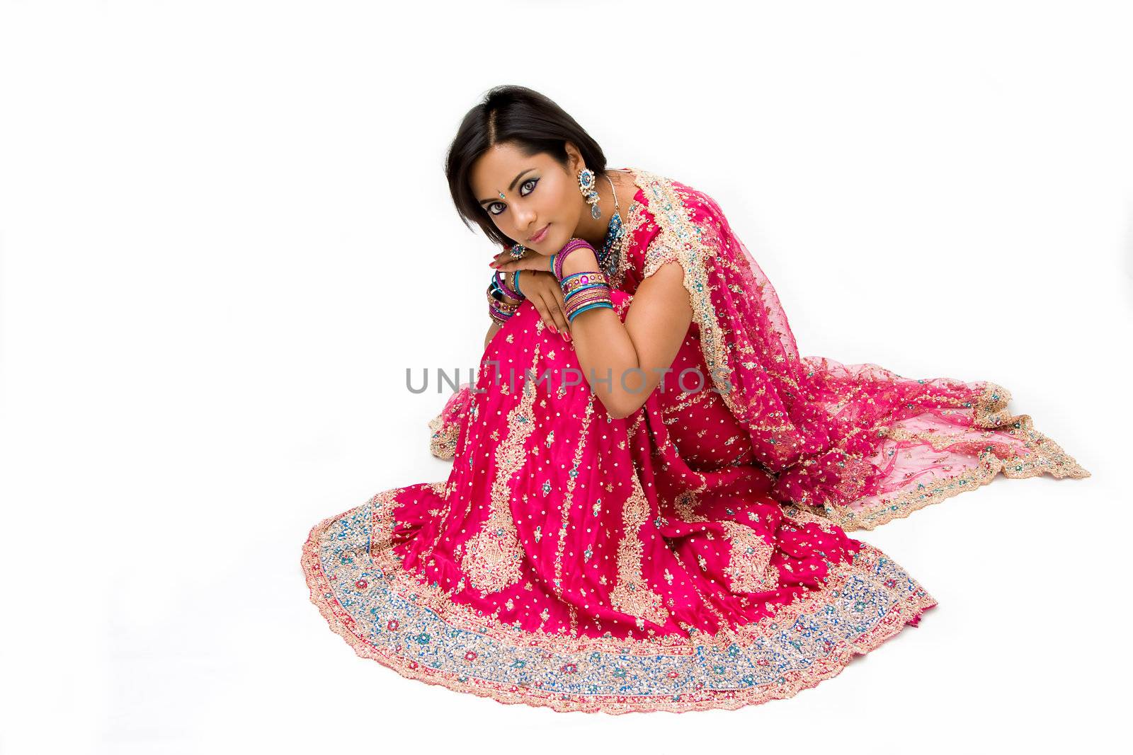 Beautiful Bangali bride sitting by phakimata