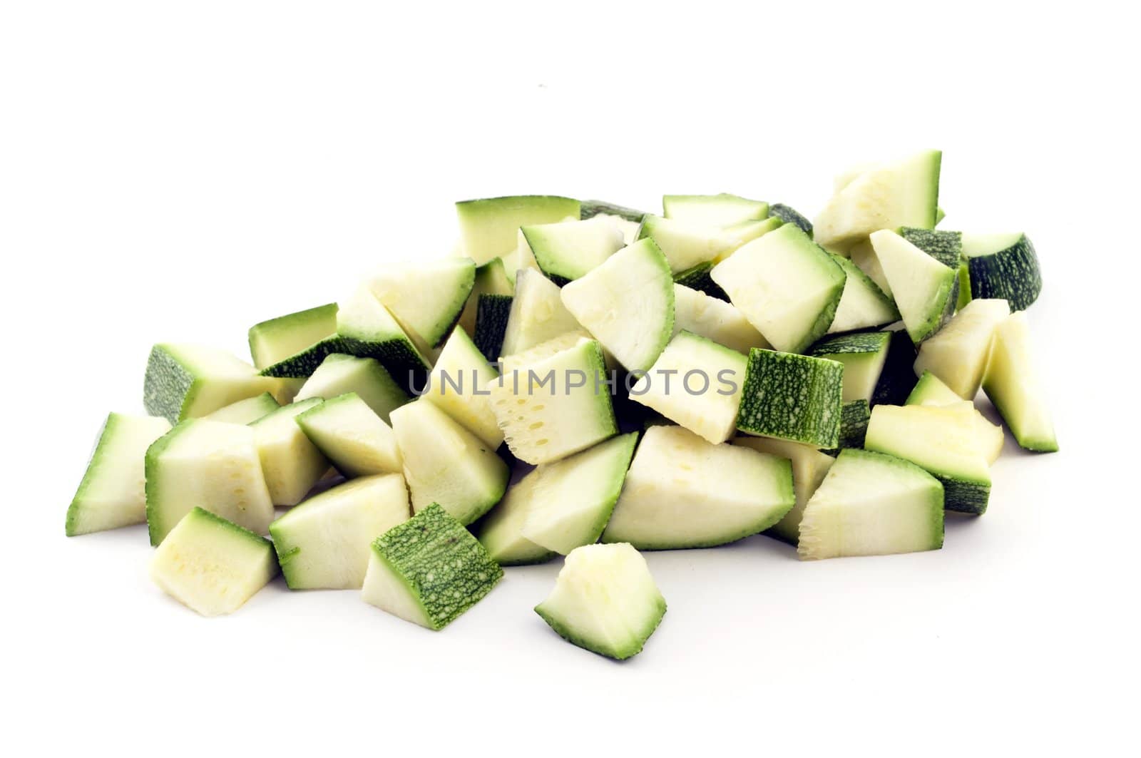 pieces of zucchini grouped isolated on white background