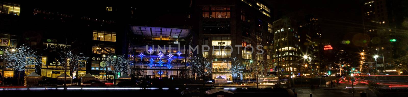 The Time Warner Center mall at Columbus Circle in New York City at night decorated for the Christmas holiday