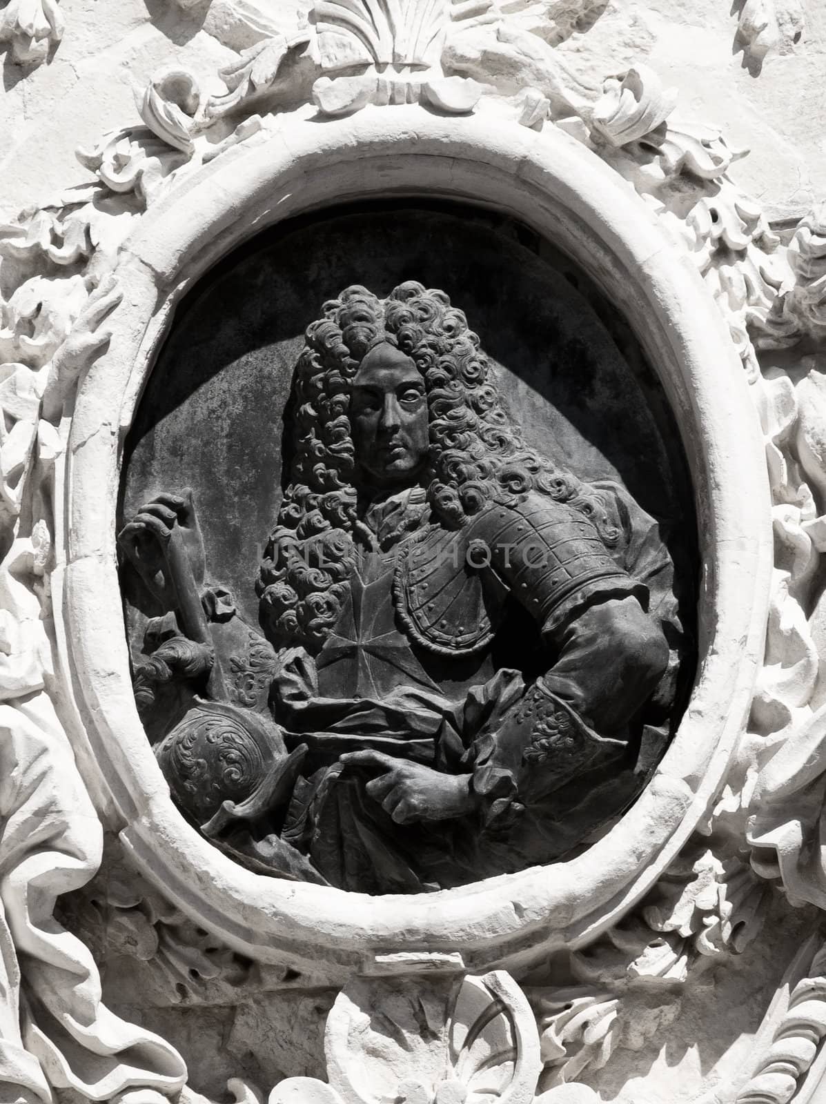 Motif of the Order of St John Grandmaster Vilhena above the entrance to the palace which bears his name in Mdina in Malta