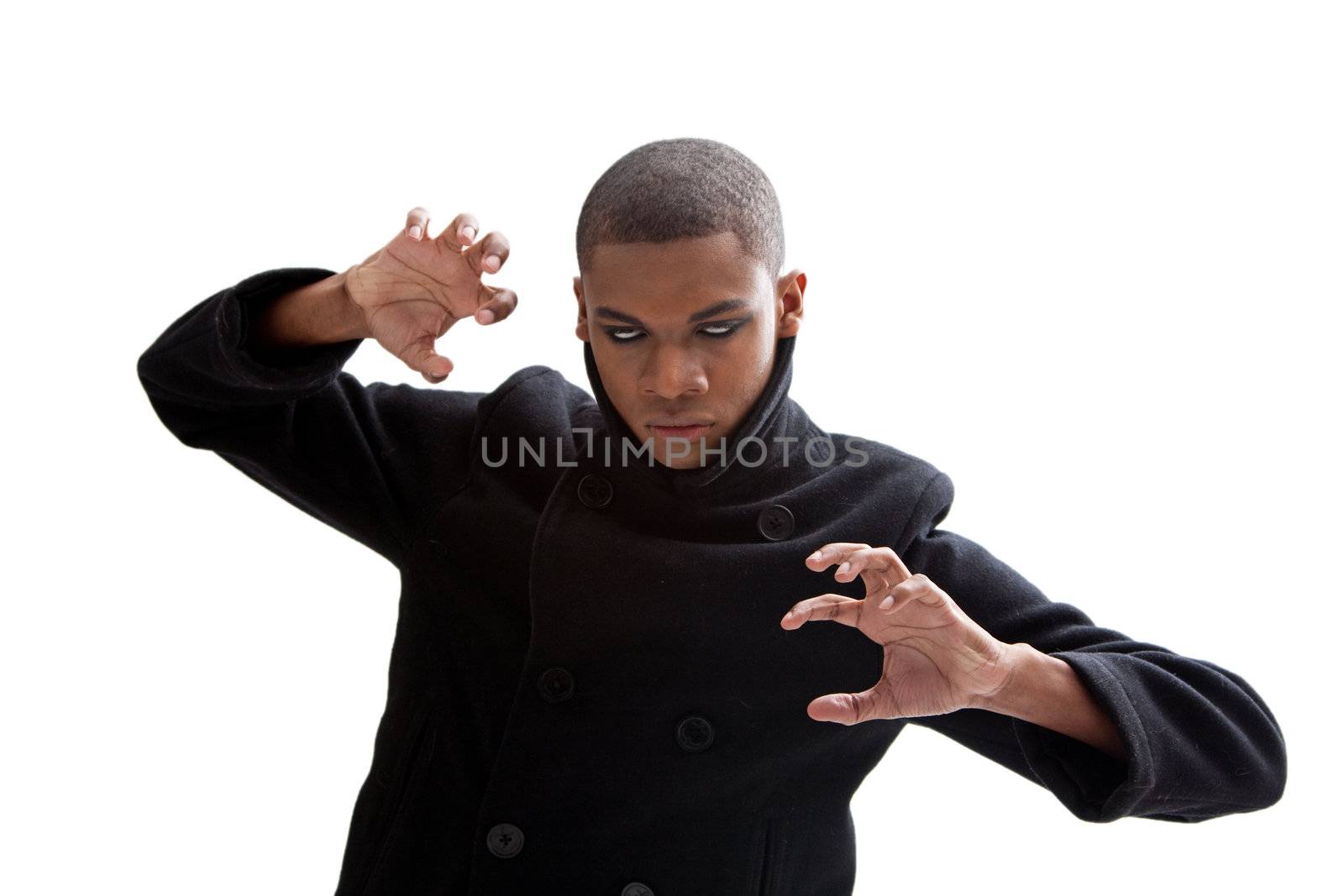 African man with smokey white eyes, strong expression and black coat, isolated