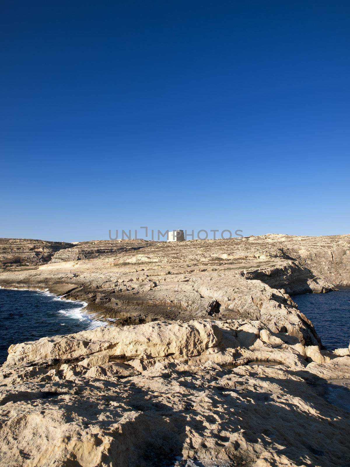 The Dwejra Tower at Dwejra in Gozo was built in 1651 to guard the medicinal plant on Fungus Rock.  The rock is too steep to climb so a sort of hoist resembling a funicular was built to ease the collection of this plant.