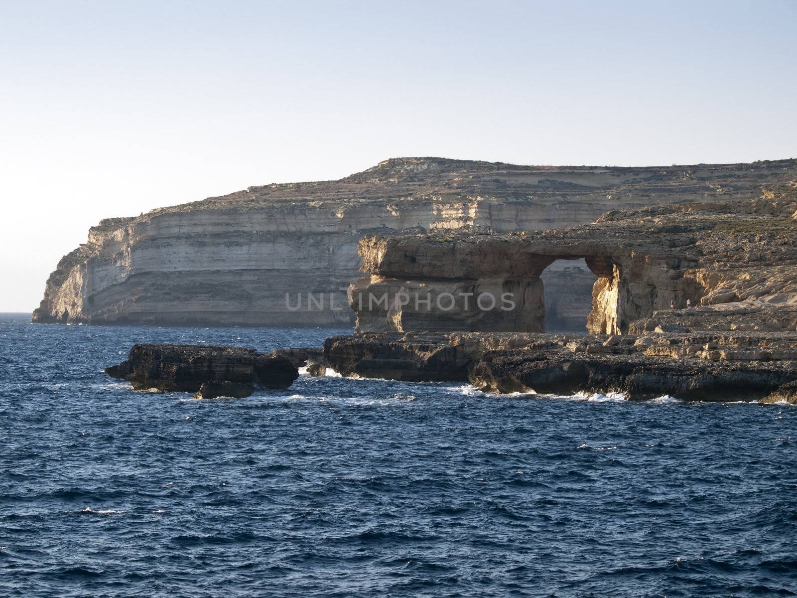 A seascape from Dwejra in Gozo showing the Azure Window and coast